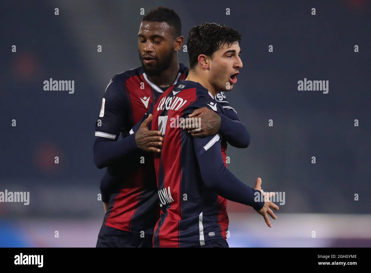 Riccardo Orsolini of Bologna FC celebrates with team mate Stefano Denswil after scoring to give the side a 2-1 lead during the Coppa Italia match at Renato Dall'Ara, Bologna. Picture date: 25th November 2020. Picture credit should read: Jonathan Moscrop/Sportimage via PA Images Stock Photo