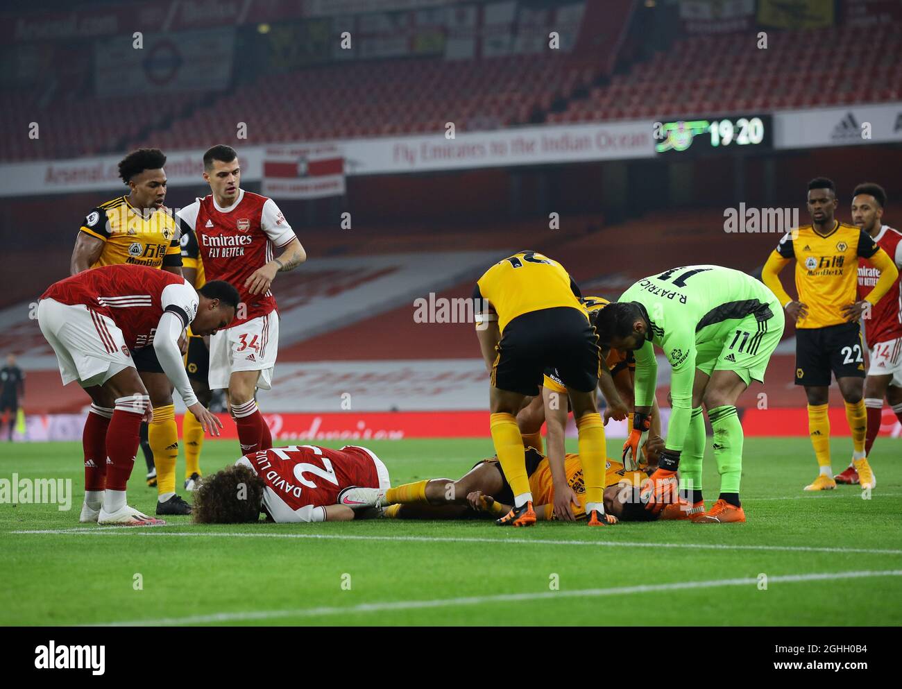 ArsenalÕs David Luiz and WolvesÕ Raul Jimenez receive treatment after a clash of heads during the Premier League match at the Emirates Stadium, London. Picture date: 29th November 2020. Picture credit should read: David Klein/Sportimage via PA Images Stock Photo