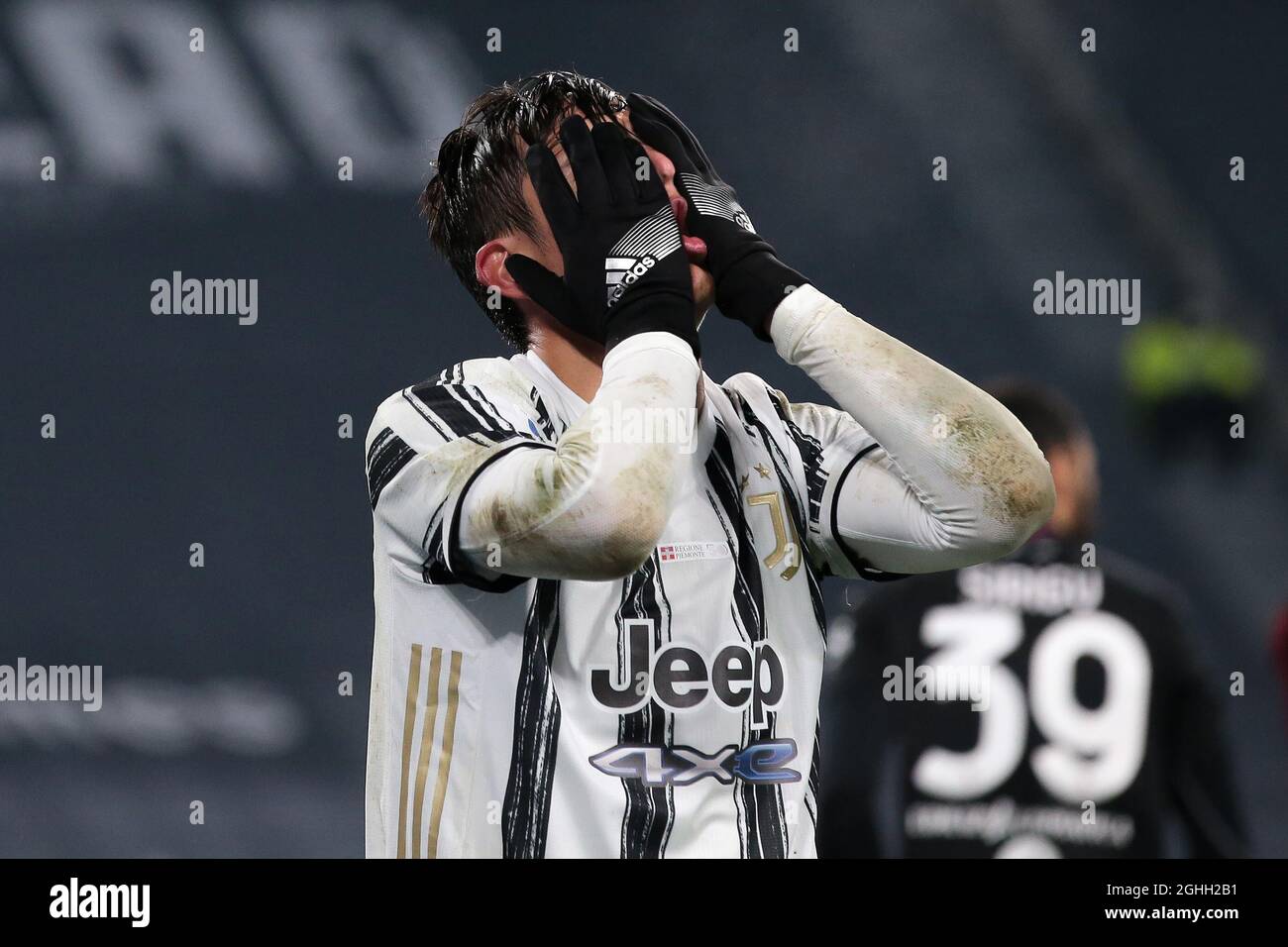 Paulo Dybala of Juventus reacts after having a shot well saved by Salvatore Sirigu of Torino FC during the Serie A match at Allianz Stadium, Turin. Picture date: 5th December 2020. Picture credit should read: Jonathan Moscrop/Sportimage via PA Images Stock Photo