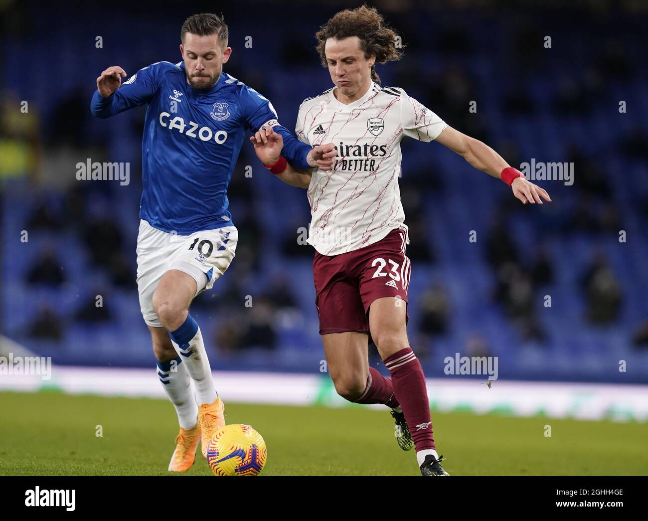 Gylfi Sigurdsson of Everton challenged by David Luiz of Arsenal during the Premier League match at Goodison Park, Liverpool. Picture date: 19th December 2020. Picture credit should read: Andrew Yates/Sportimage via PA Images Stock Photo