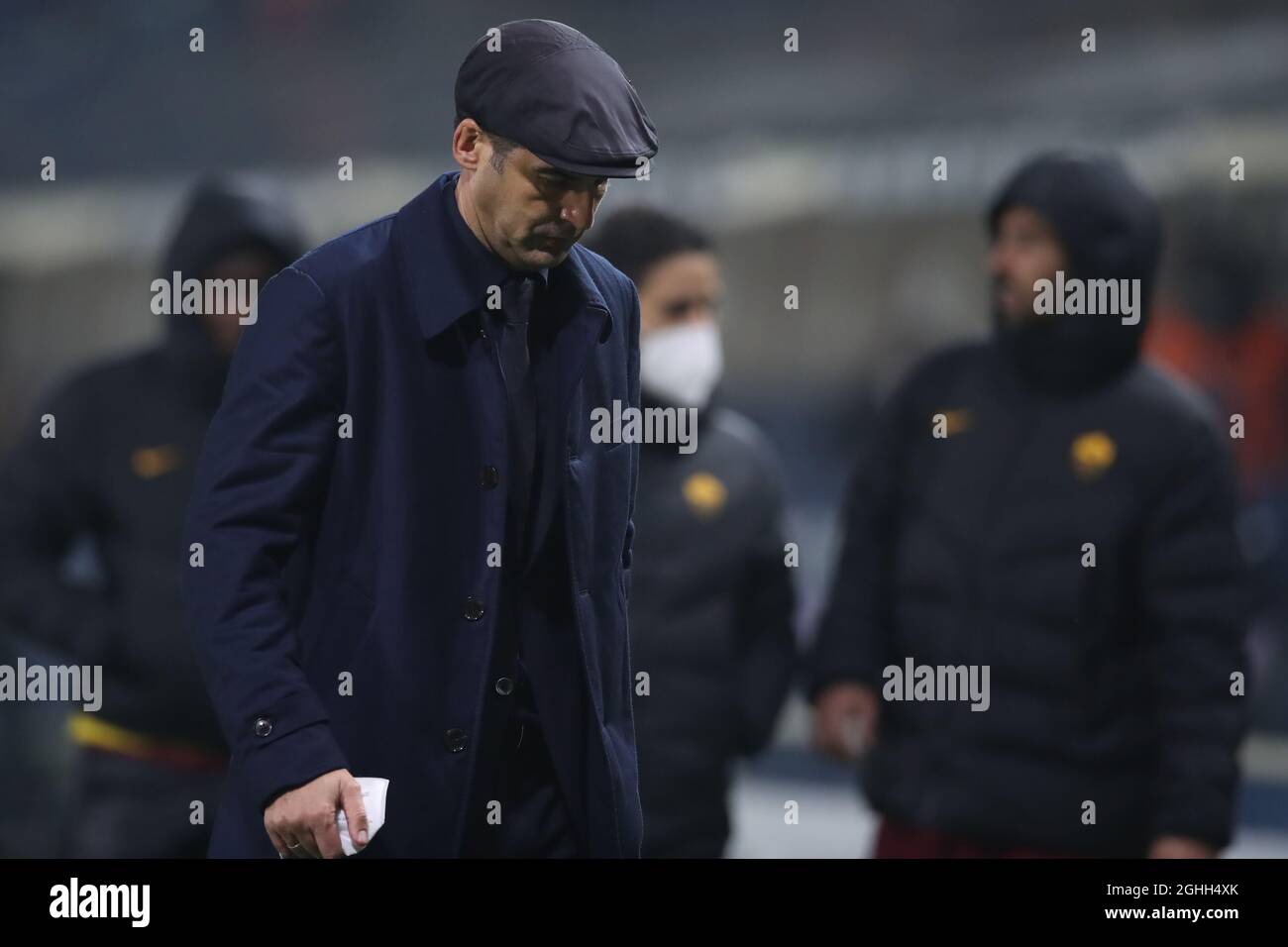 Paolo Fonseca Head coach of AS Roma leaves the field of play with his head bowed following the final whistle during the Serie A match at Gewiss Stadium, Bergamo. Picture date: 20th December 2020. Picture credit should read: Jonathan Moscrop/Sportimage via PA Images Stock Photo