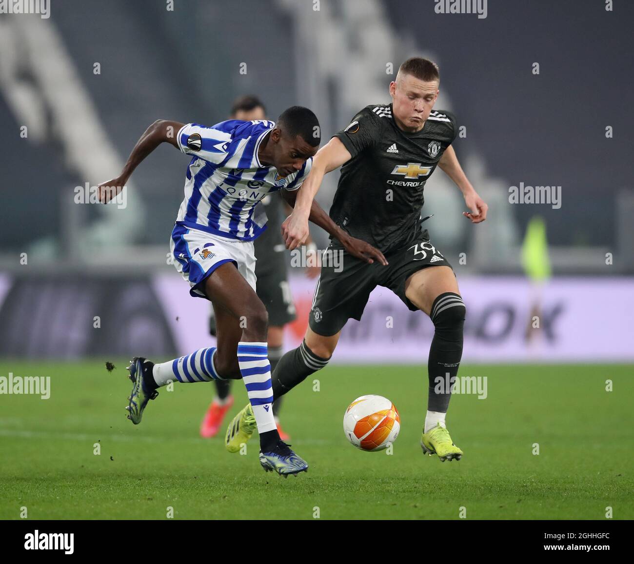 Alexander Isak Of Real Sociedad Tackled By Scott McTominay Of alexander-isak-of-real-sociedad-tackled-by-scott-mctominay-of
