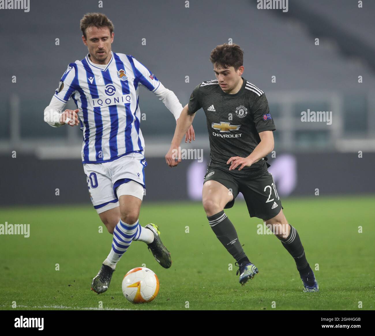 Daniel James of Manchester United tackles Nacho Monreal of Real Sociedad during the UEFA Europa League match at Juventus Stadium, Turin. Picture date: 18th February 2021. Picture credit should read: Jonathan Moscrop/Sportimage via PA Images Stock Photo