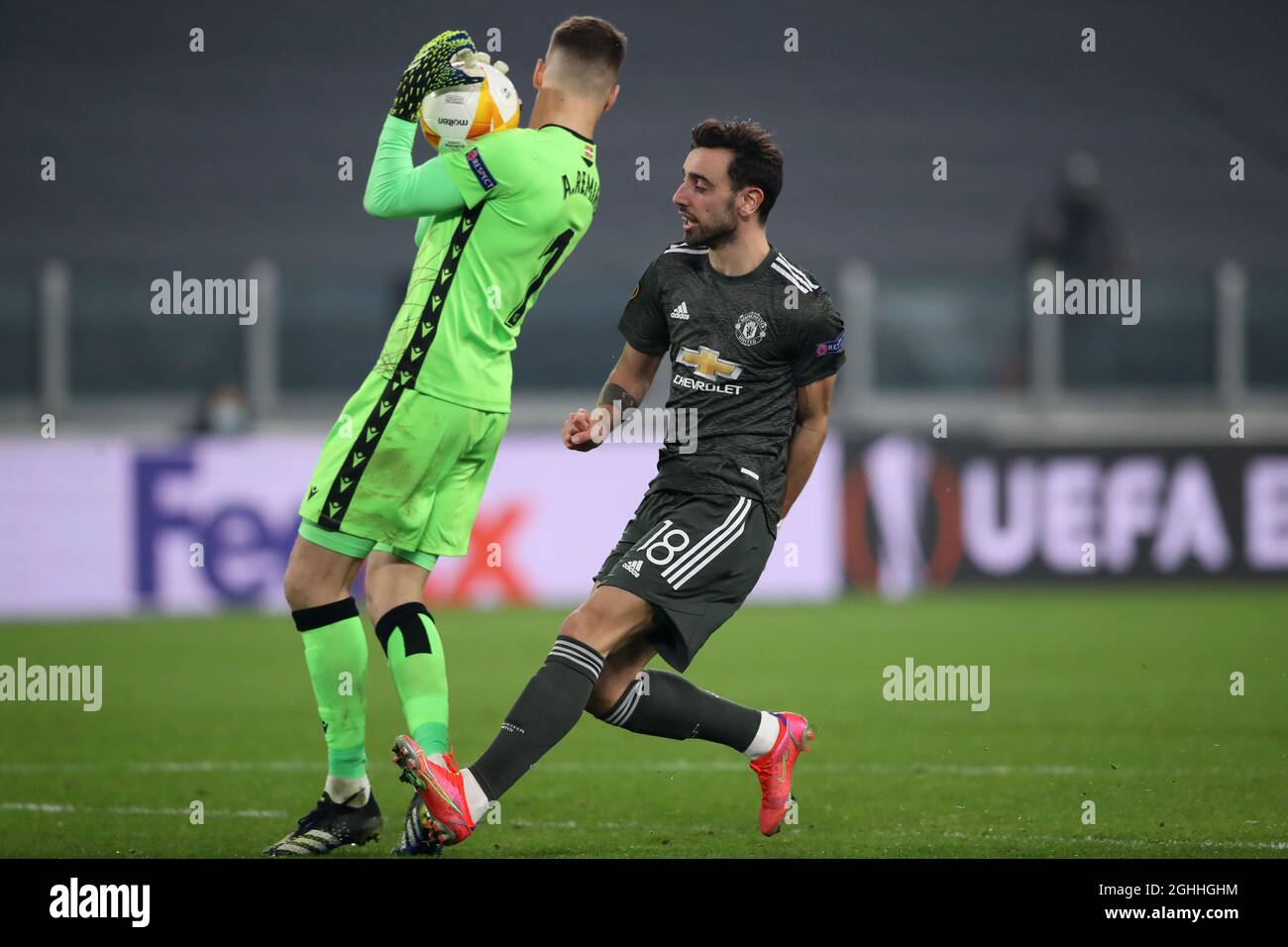 Alejandro Remiro of Real Sociedad. Gathers the ball as Bruno Fernandes of Manchester United bares down on goal during the UEFA Europa League match at Juventus Stadium, Turin. Picture date: 18th February 2021. Picture credit should read: Jonathan Moscrop/Sportimage via PA Images Stock Photo