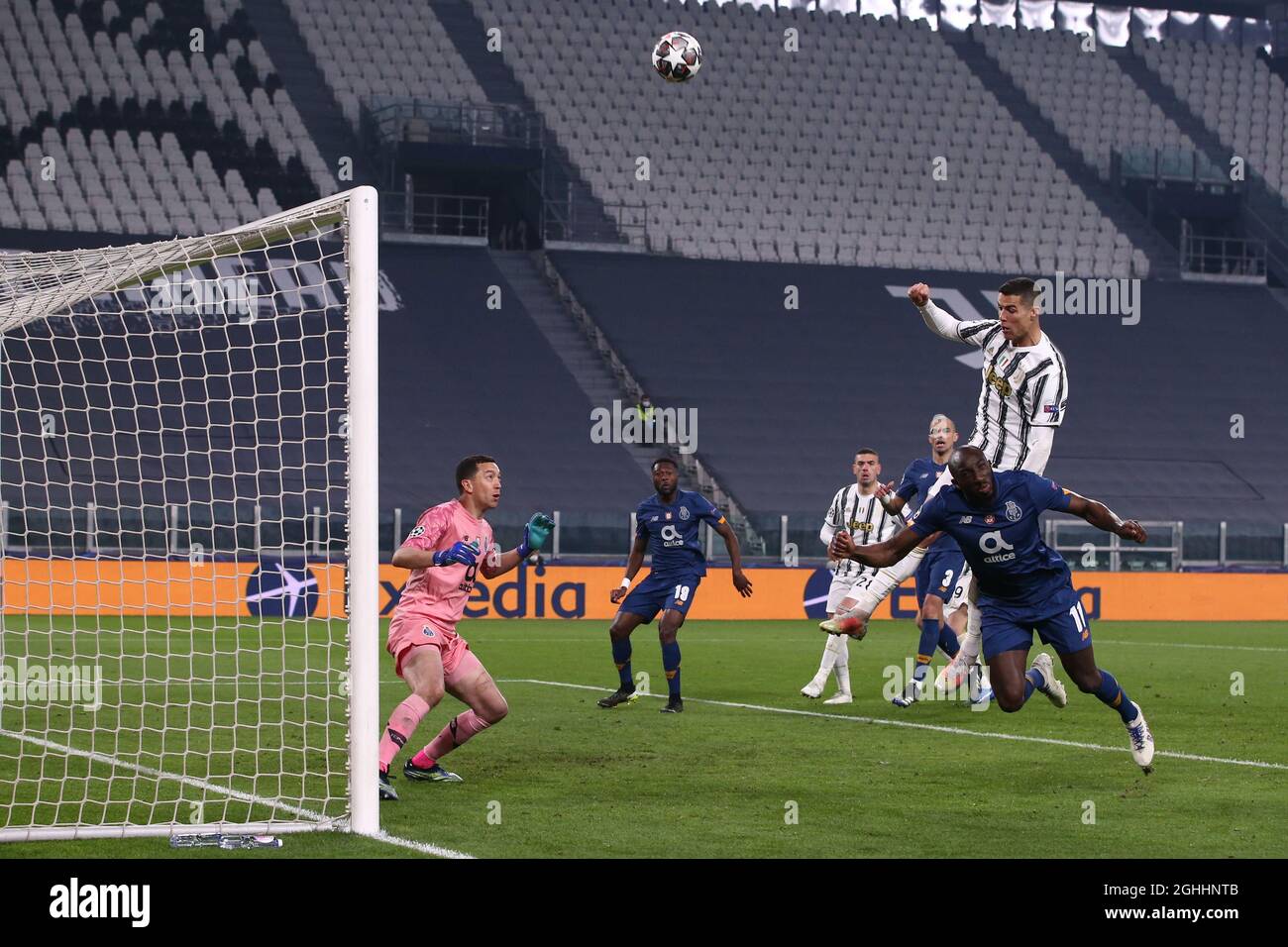 Moussa Marega Of Fc Porto Heads The Ball Away As Cristiano Ronaldo Of Juventus Bares Down On Goal During The Uefa Champions League Match At Allianz Stadium Turin Picture Date 9th March Moussa Marega Of Fc Porto Heads The Ball Away As Cristiano Ronaldo Of Juventus Bares Down On Goal During The Uefa Champions League Match At Allianz Stadium Turin Picture Date 9th March