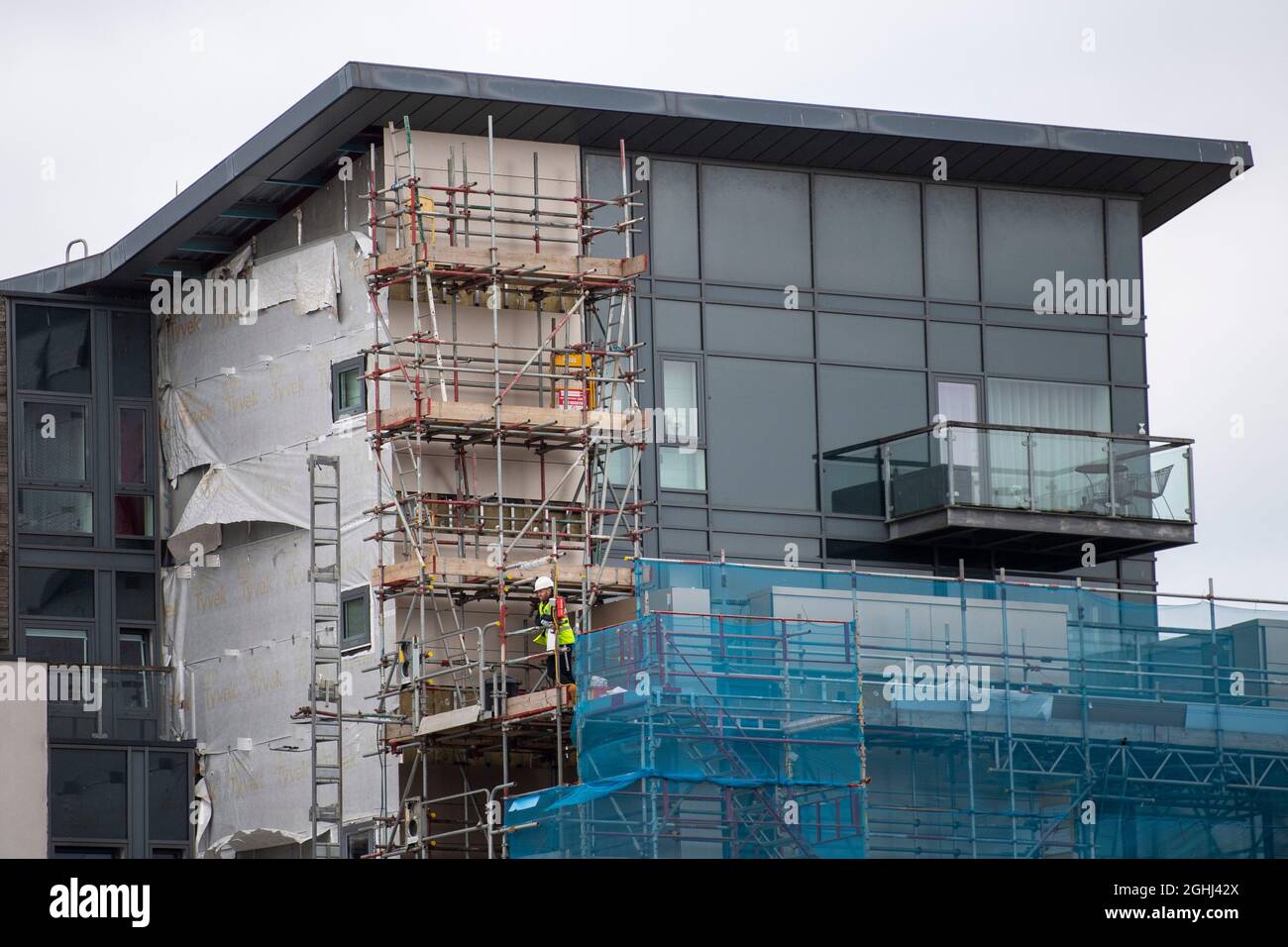 Cladding removed on a building in Cardiff, Wales, United Kingdom Stock Photo Alamy