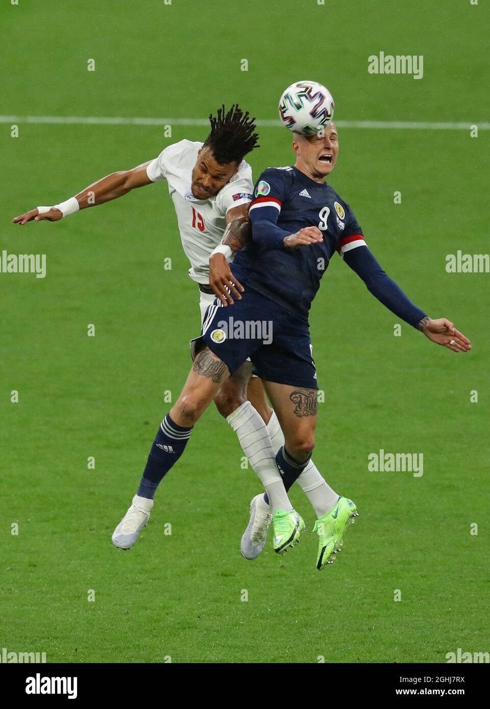 London, England, 18th June 2021. Tyrone Mings of England challenges Lyndon Dykes of Scotland during the UEFA European Championships match at Wembley Stadium, London. Picture credit should read: David Klein / Sportimage via PA Images Stock Photo
