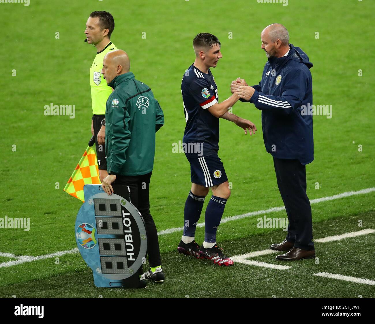 London, England, 18th June 2021. Steve Clark manager of Scotland greets Billy Gilmour of Scotland as he substitutes him  during the UEFA European Championships match at Wembley Stadium, London. Picture credit should read: David Klein / Sportimage via PA Images Stock Photo