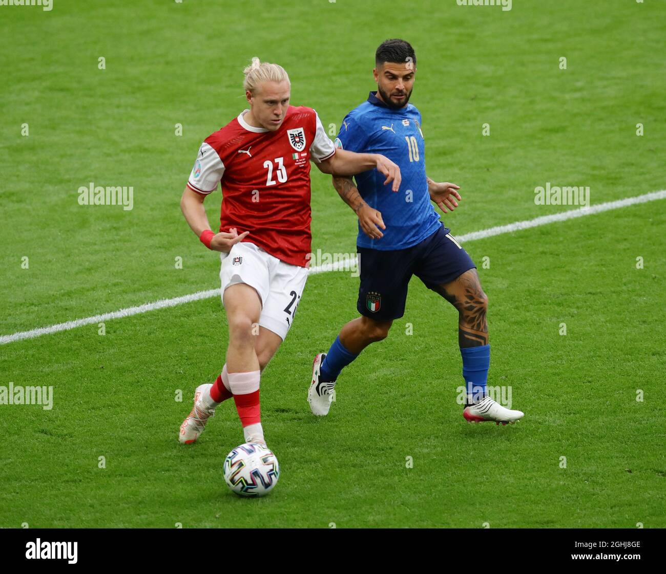London, England, 26th June 2021. Xaver Schlager of Austria tackled by Lorenzo Insigne of Italy  during the UEFA European Championships match at Wembley Stadium, London. Picture credit should read: David Klein / Sportimage via PA Images Stock Photo