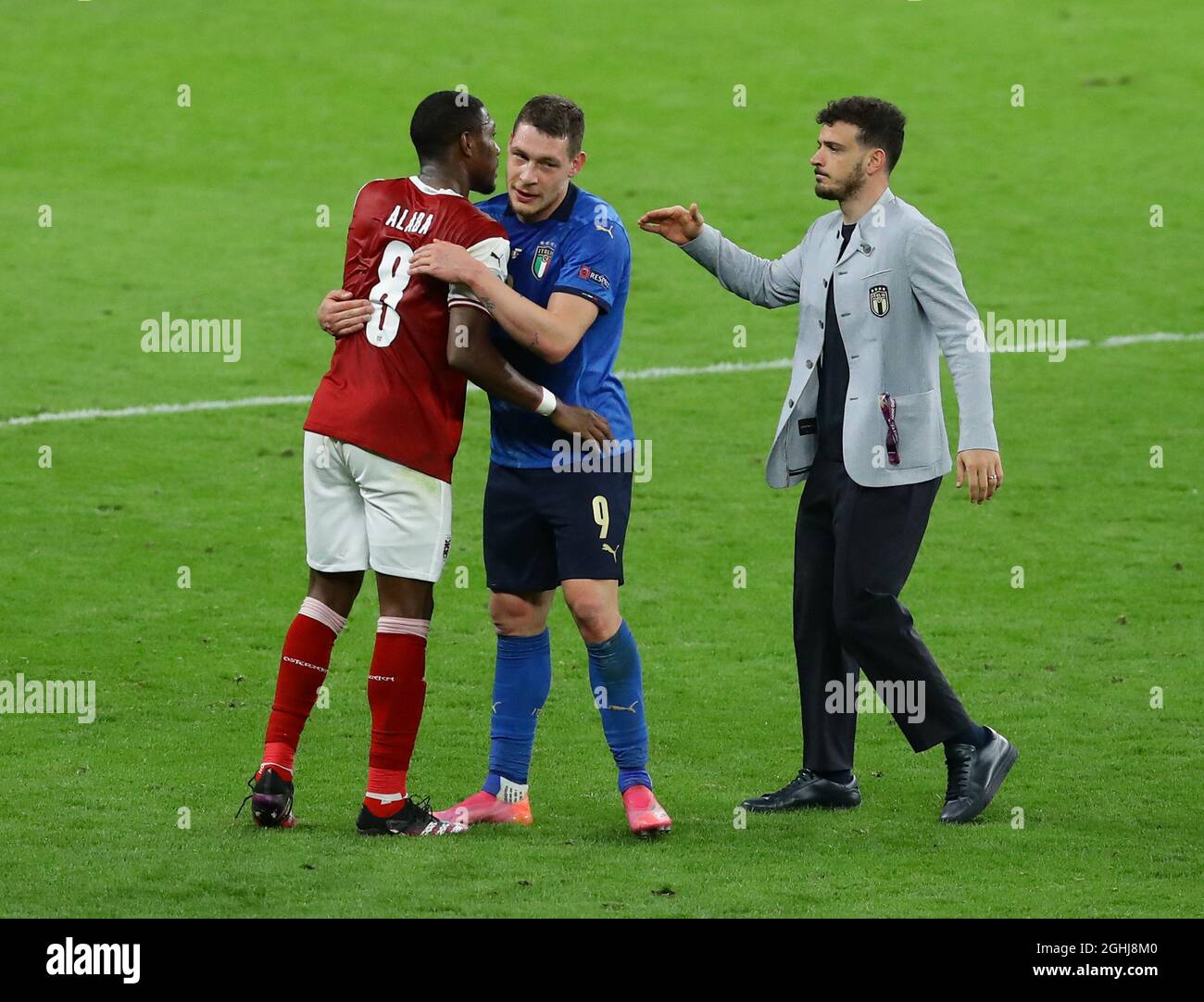 London, England, 26th June 2021. David Alaba of Austria consoled  Andrea Belotti of Italy during the UEFA European Championships match at Wembley Stadium, London. Picture credit should read: David Klein / Sportimage via PA Images Stock Photo
