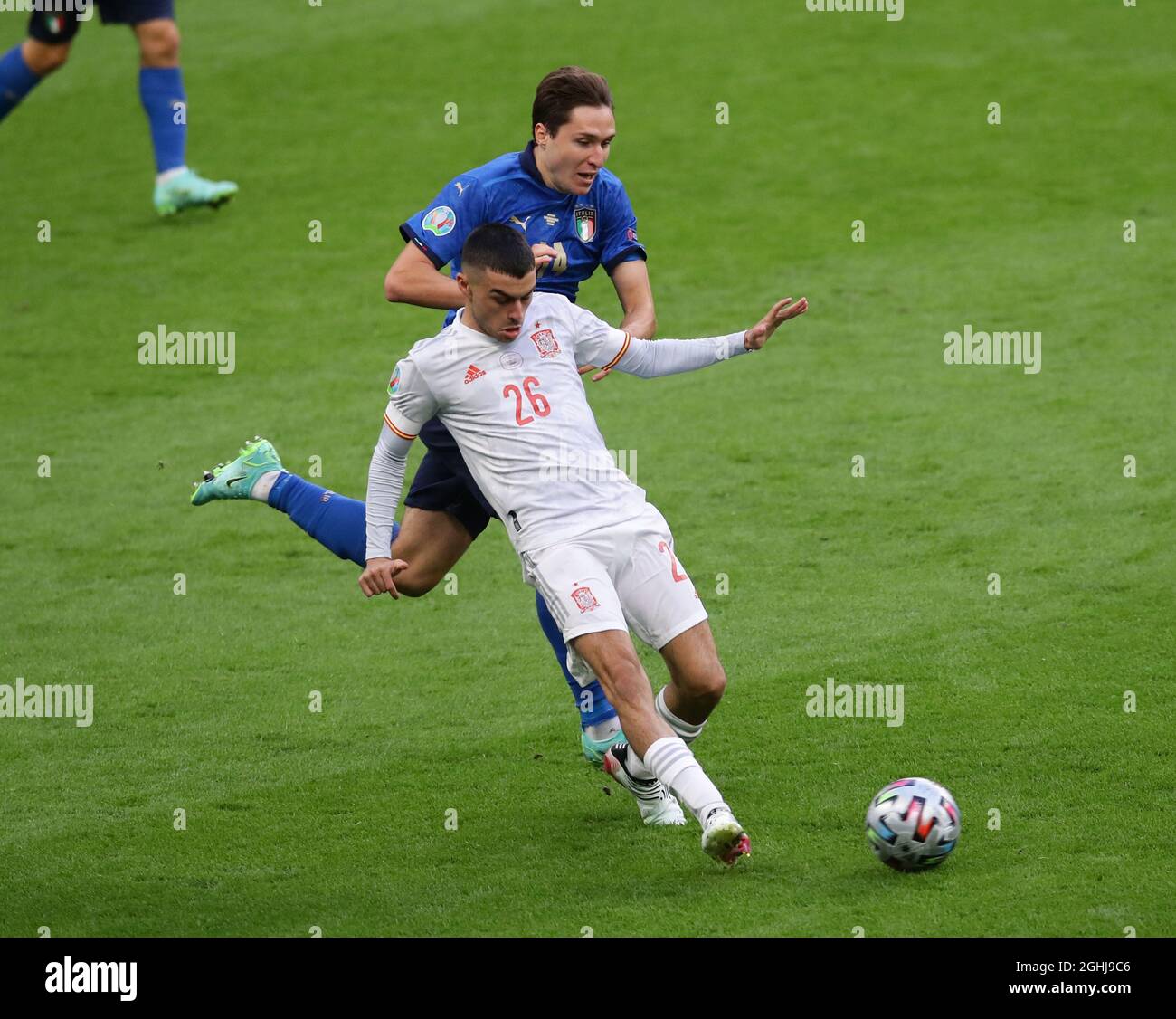 London, England, 6th July 2021. Federico Chiesa of Italy tackles Pedri of Spain  during the UEFA Euro 2020 match at Wembley Stadium, London. Picture credit should read: David Klein / Sportimage via PA Images Stock Photo