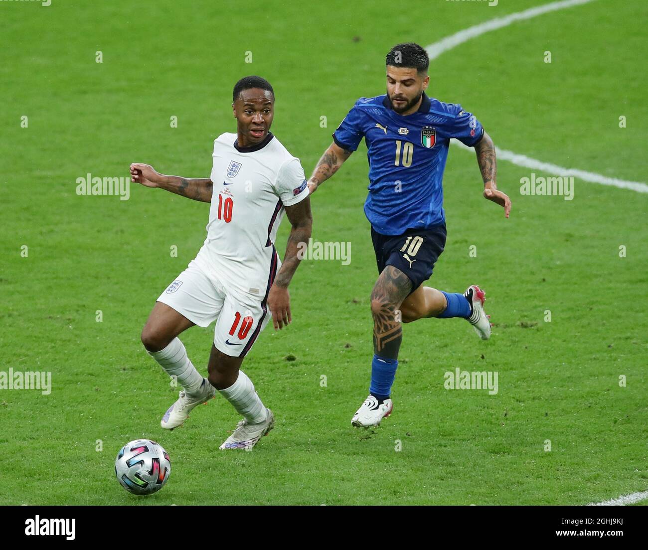 London, England, 11th July 2021. Raheem Sterling of England chased by Lorenzo Insigne of Italy  during the UEFA Euro 2020 final at Wembley Stadium, London. Picture credit should read: David Klein / Sportimage via PA Images Stock Photo
