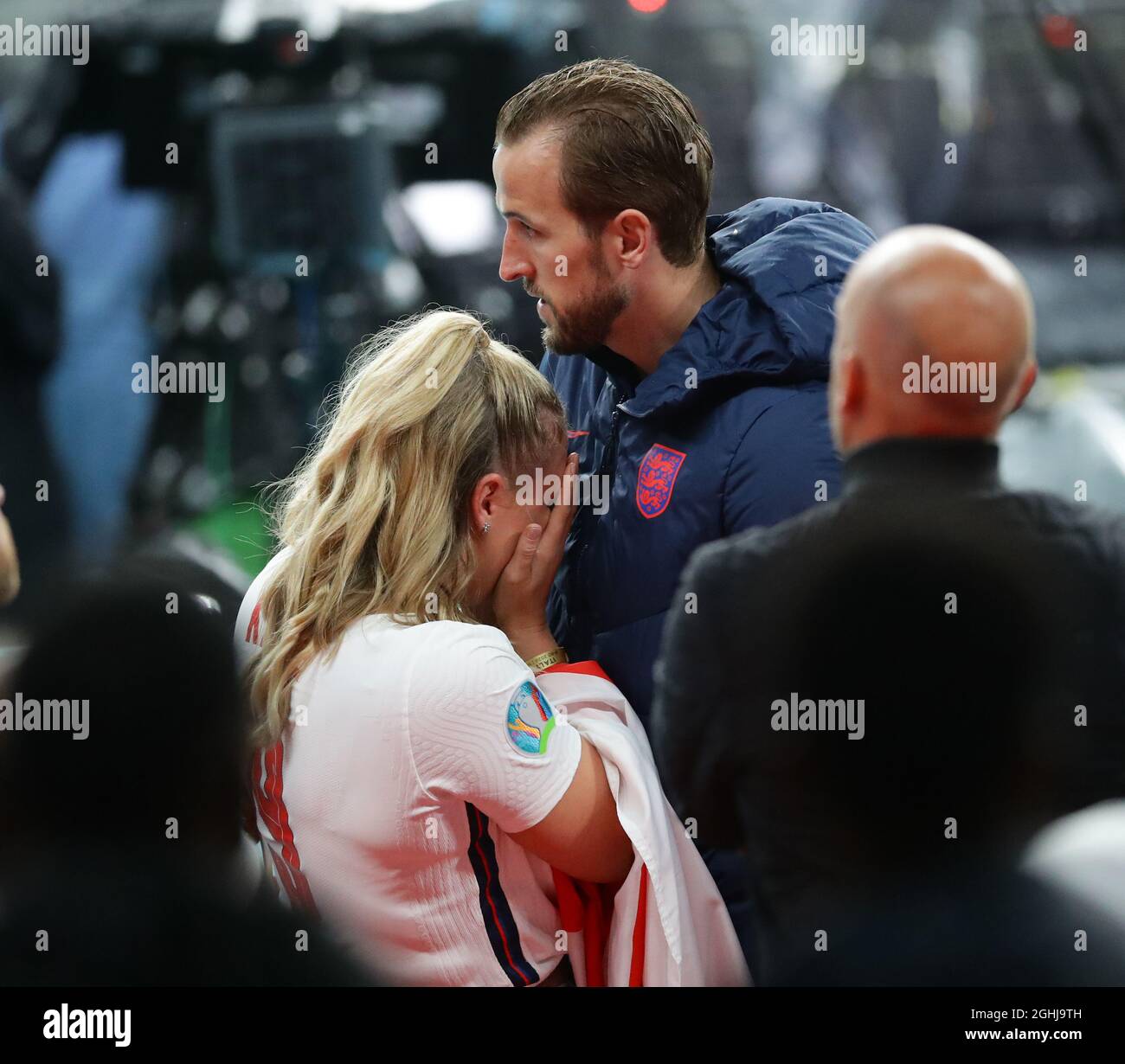 London, England, 11th July 2021.  Distraught Kate and Harry Kane shed tears as they meet up after the game during the UEFA Euro 2020 final at Wembley Stadium, London. Picture credit should read: David Klein / Sportimage via PA Images Stock Photo