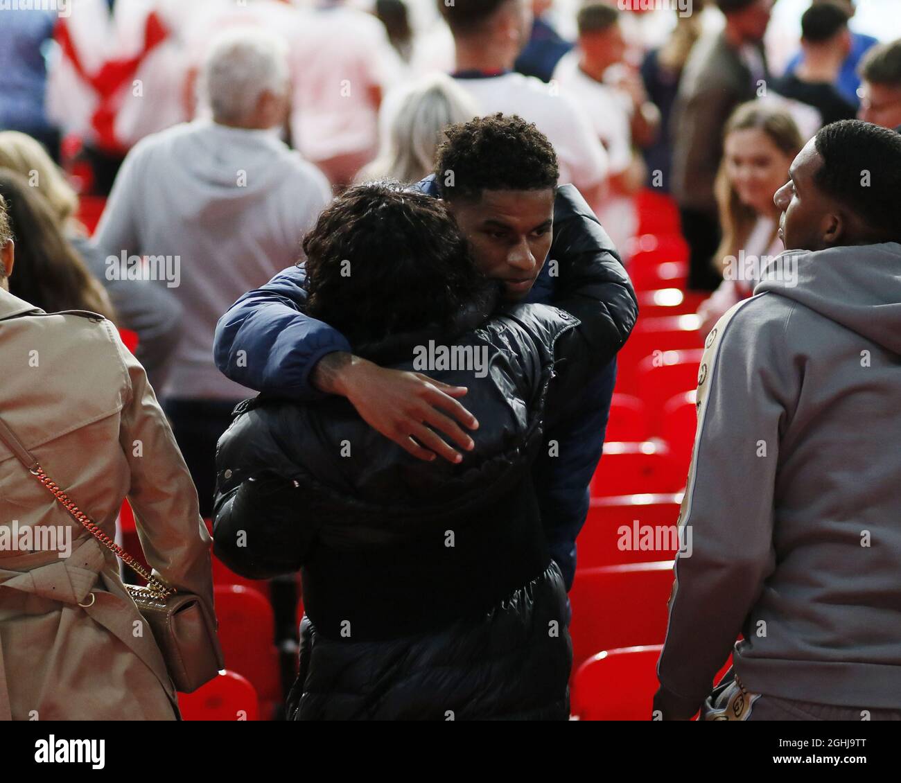 London, England, 11th July 2021. Marcus Rashford of England hugs his mum  during the UEFA Euro 2020 final at Wembley Stadium, London. Picture credit should read: David Klein / Sportimage via PA Images Stock Photo