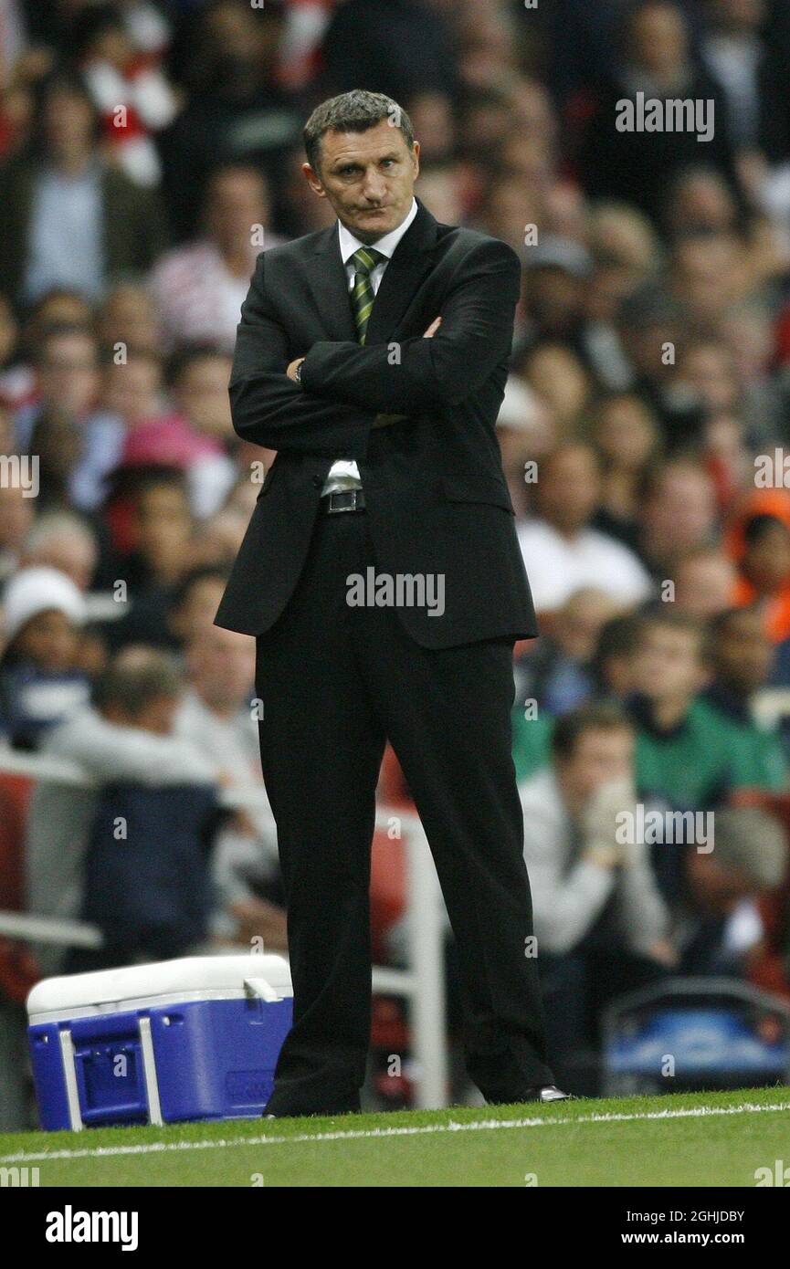 Celtic's Tony Mowbray looks on dismayed after the award of a dubious penalty during the UEFA Champions League Qualifying between Arsenal v Celtic. Stock Photo