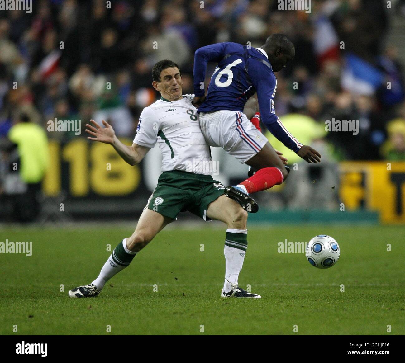 France's Lassana Diarra tussles with Republic of Ireland's Keith Andrews during FIFA 2010 World Cup Qualifying match between France and Republic of Ireland, at Stade de France in Saint-Denis near Paris, France. Stock Photo