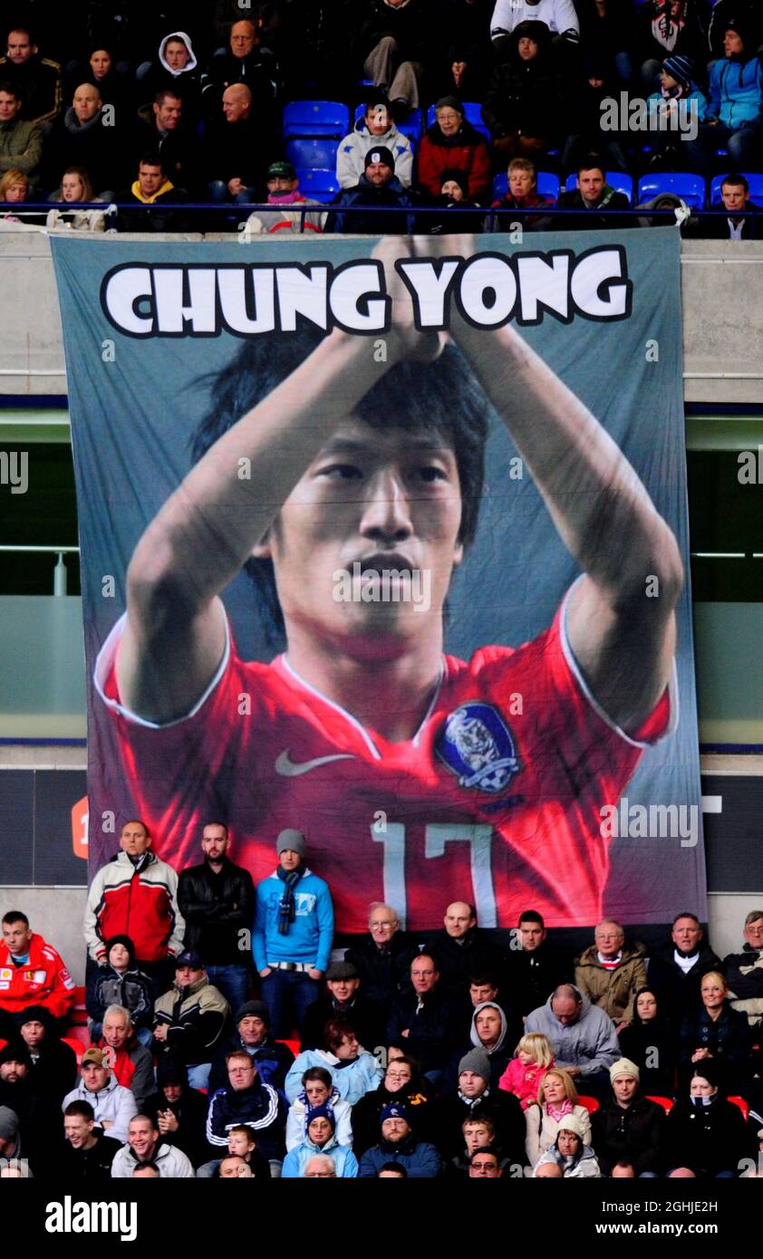 Bolton fans display a giant poster of Korean player Lee Chung Yong of Bolton Wanderers during Barclays Premier League match between Bolton Wanderers and Blackburn Rovers at Reebok Stadium in Middlebrook. Stock Photo