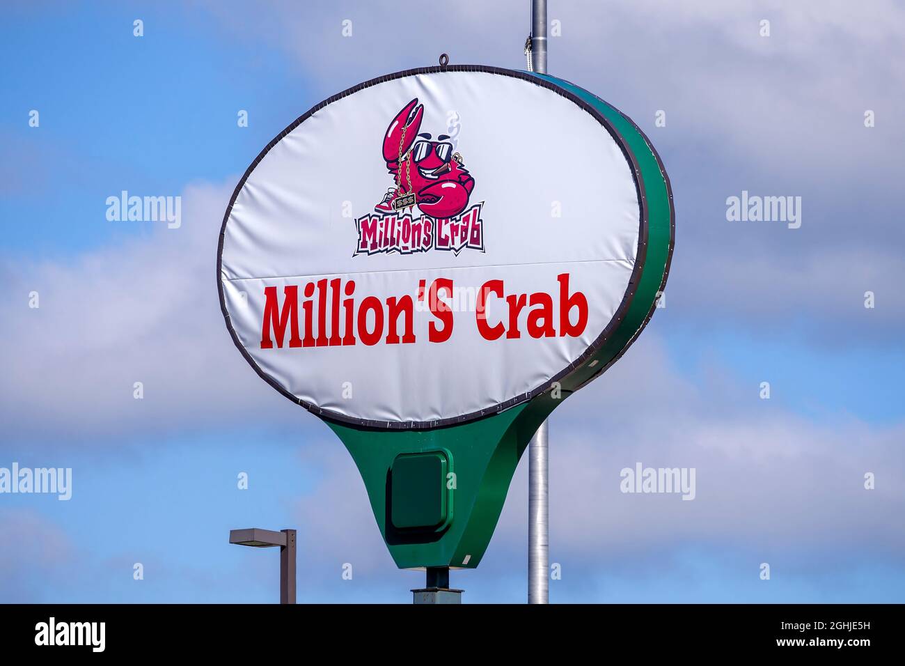 Millions Crab seafood restaurant sign in Green Bay, Wisconsin, specializing in Cajun style food. Stock Photo