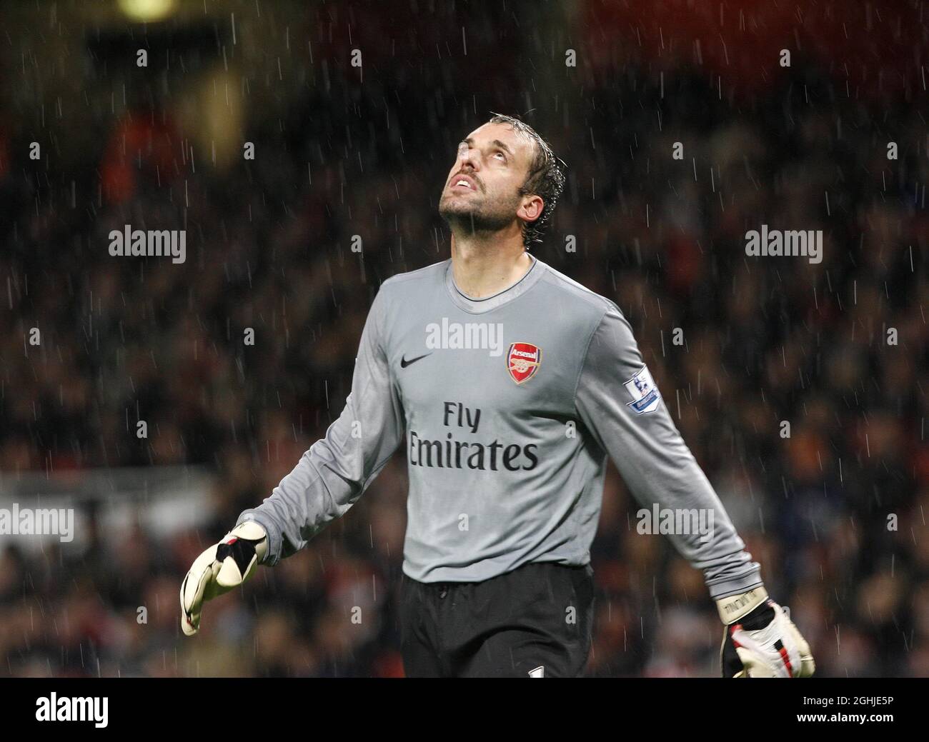 Arsenal's Manuel Almunia looks on as his side goes 2-0 down during the Barclays Premier League match between Arsenal and Chelsea at Emirates Stadium, London. Stock Photo