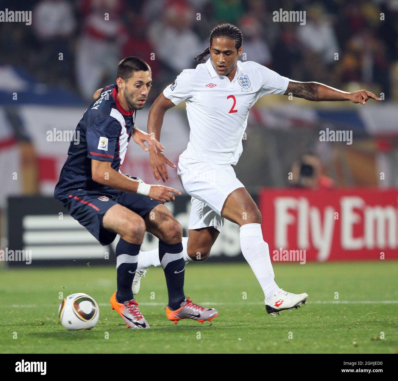 England's Glen Johnson tussles with USA's Clint Dempsey during the FIFA World Cup 2010, Group C match between England and USA at Royal Bafokeng Stadium, Rustenburg, South Africa. Stock Photo