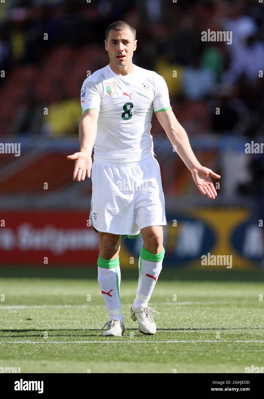 Algeria's Medhi Lacen reacts during the 2010 FIFA World Cup South Africa, Group C match between Algeria v Slovenia at Peter Mokaba Stadium, South Africa. Stock Photo
