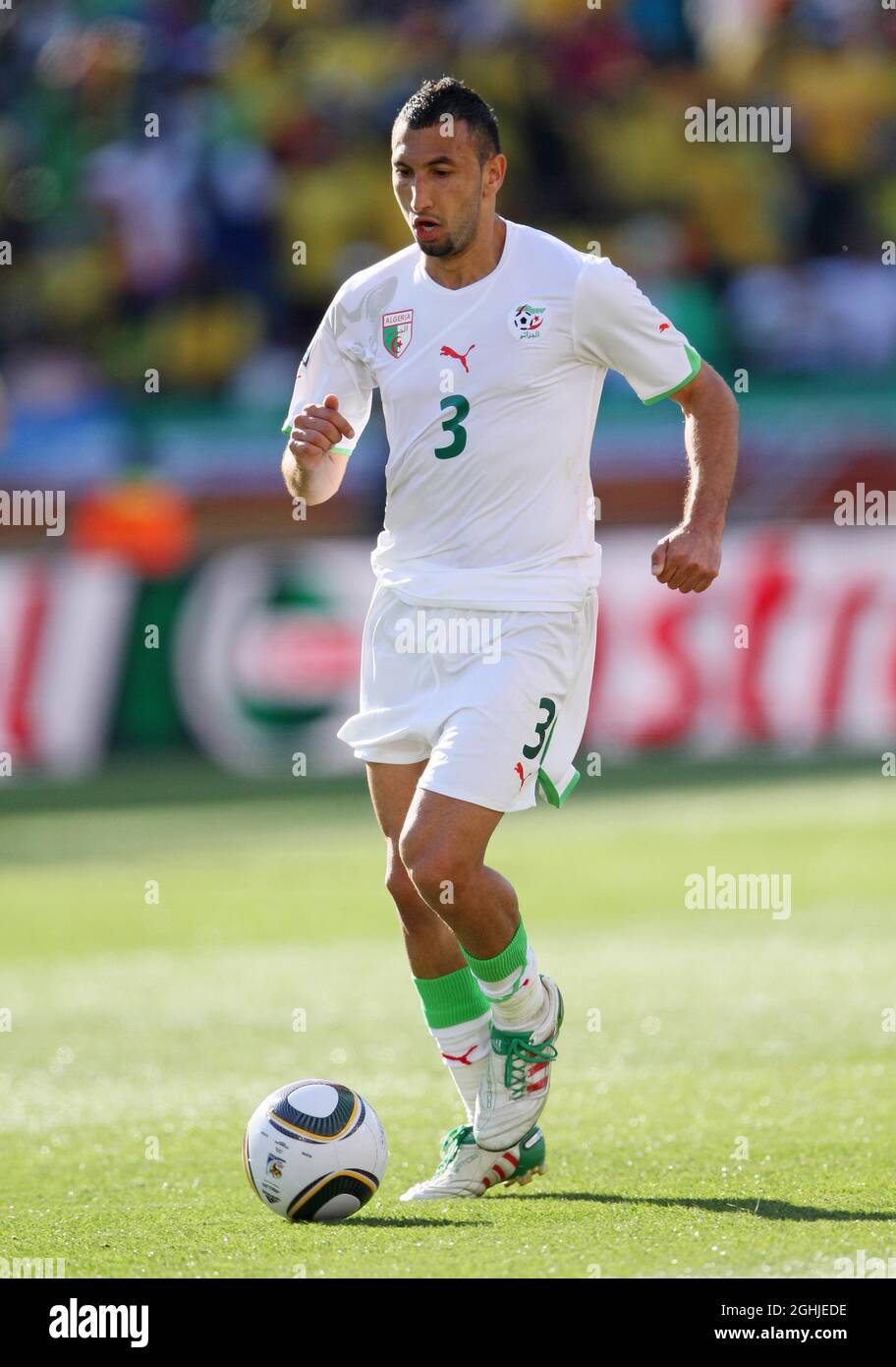 Algeria's Nadir Belhadj in action during the 2010 FIFA World Cup South Africa, Group C match between Algeria v Slovenia at Peter Mokaba Stadium, South Africa. Stock Photo