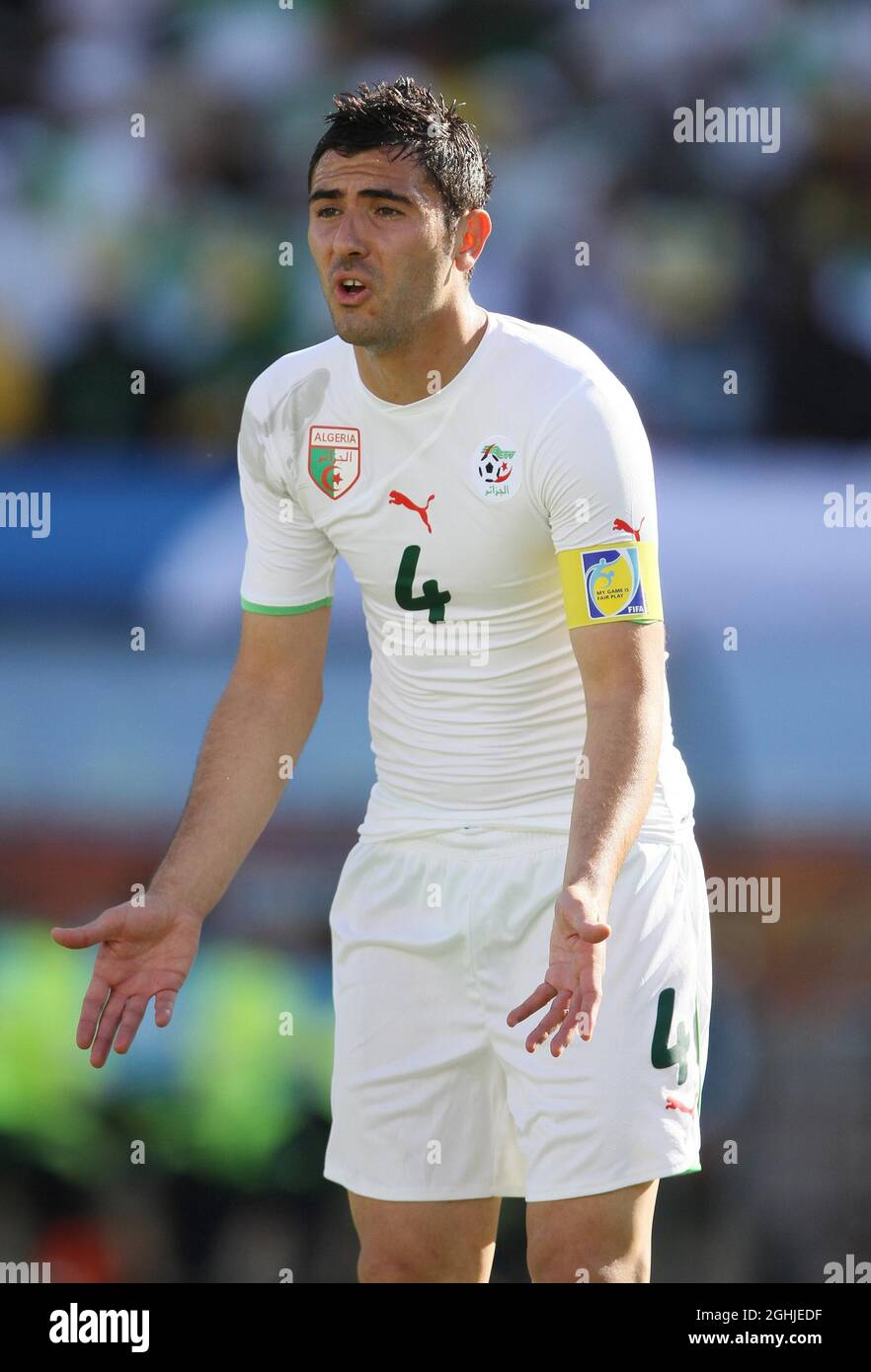 Algeria's Anther Yahia in action during the FIFA World Cup 2010 Group C match between Algeria and Slovenia at Peter Mokaba Stadium in South Africa. Stock Photo
