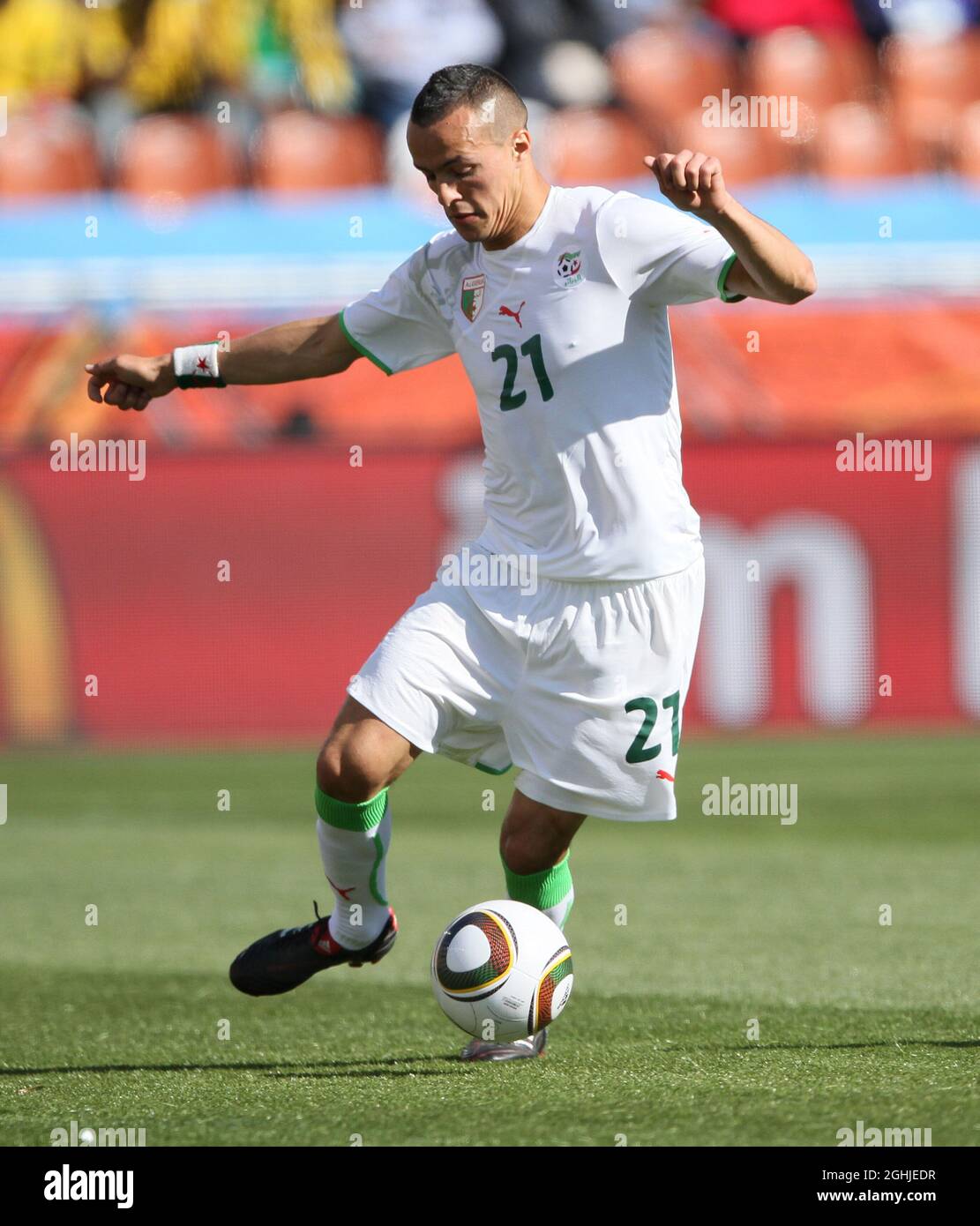 Algeria's Foued Kadir in action during the FIFA World Cup 2010 Group C match between Algeria and Slovenia at Peter Mokaba Stadium in South Africa. Stock Photo