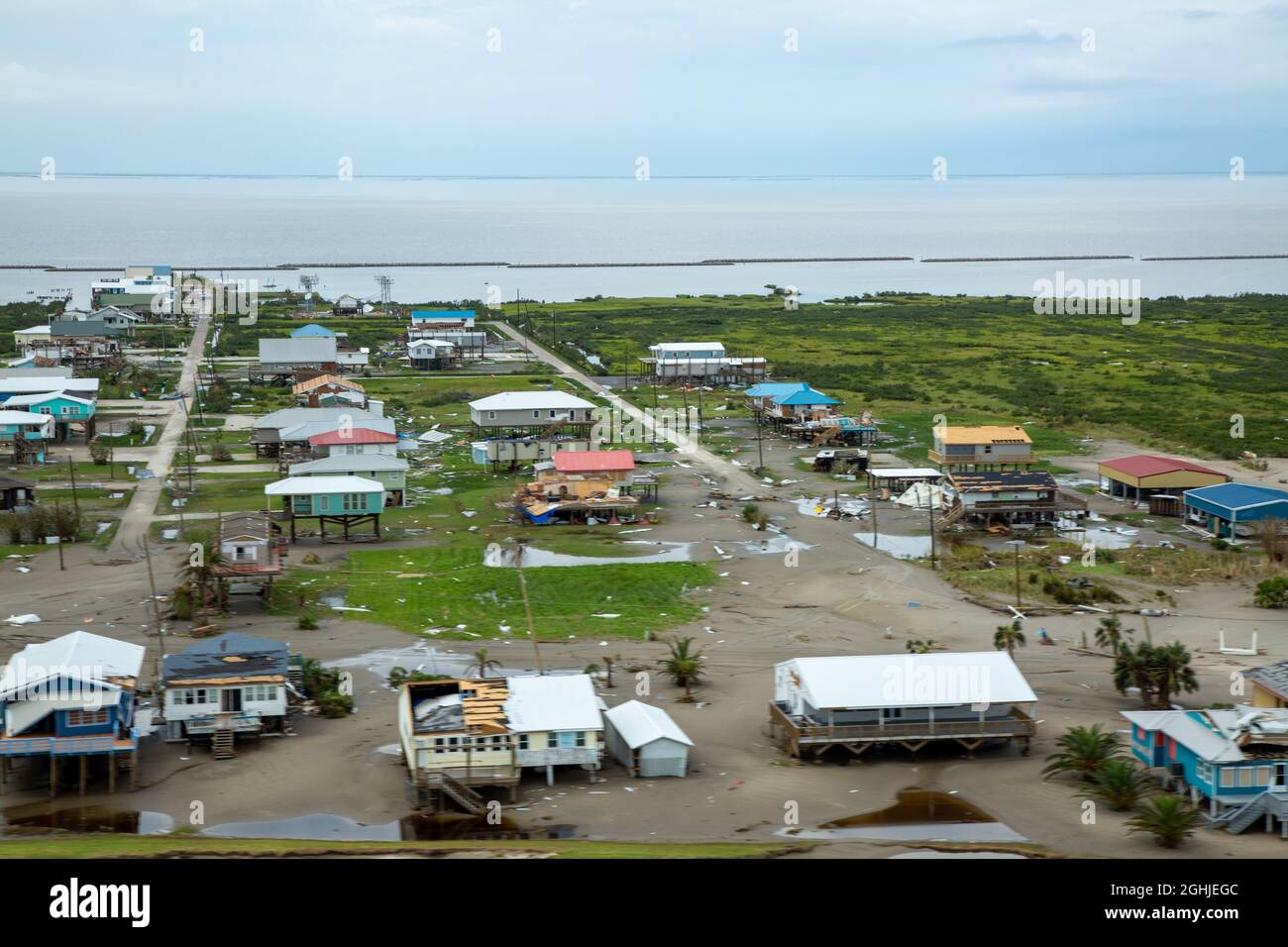 Grand Isle, United States of America. 01 September, 2021. Aerial view of the destruction caused by Category 4 Hurricane Ida on the barrier islands along Barataria Bay and the Gulf of Mexico September 1, 2021 in Grand Isle, Louisiana. Grand Isle took a direct hit from the storm and is considered uninhabitable. Credit: Maj. Grace Geiger/U.S. Army/Alamy Live News Stock Photo