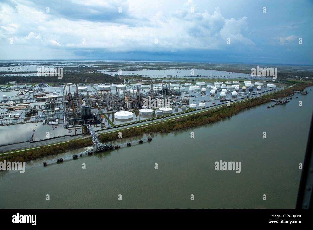 Belle Chasse, United States of America. 01 September, 2021. Aerial view of a flooded oil refinery caused by Category 4 Hurricane Ida along the west bank of the Mississippi River at Plaquemines Parish September 3, 2021 in Belle Chasse, Louisiana. Credit: Maj. Grace Geiger/U.S. Army/Alamy Live News Stock Photo