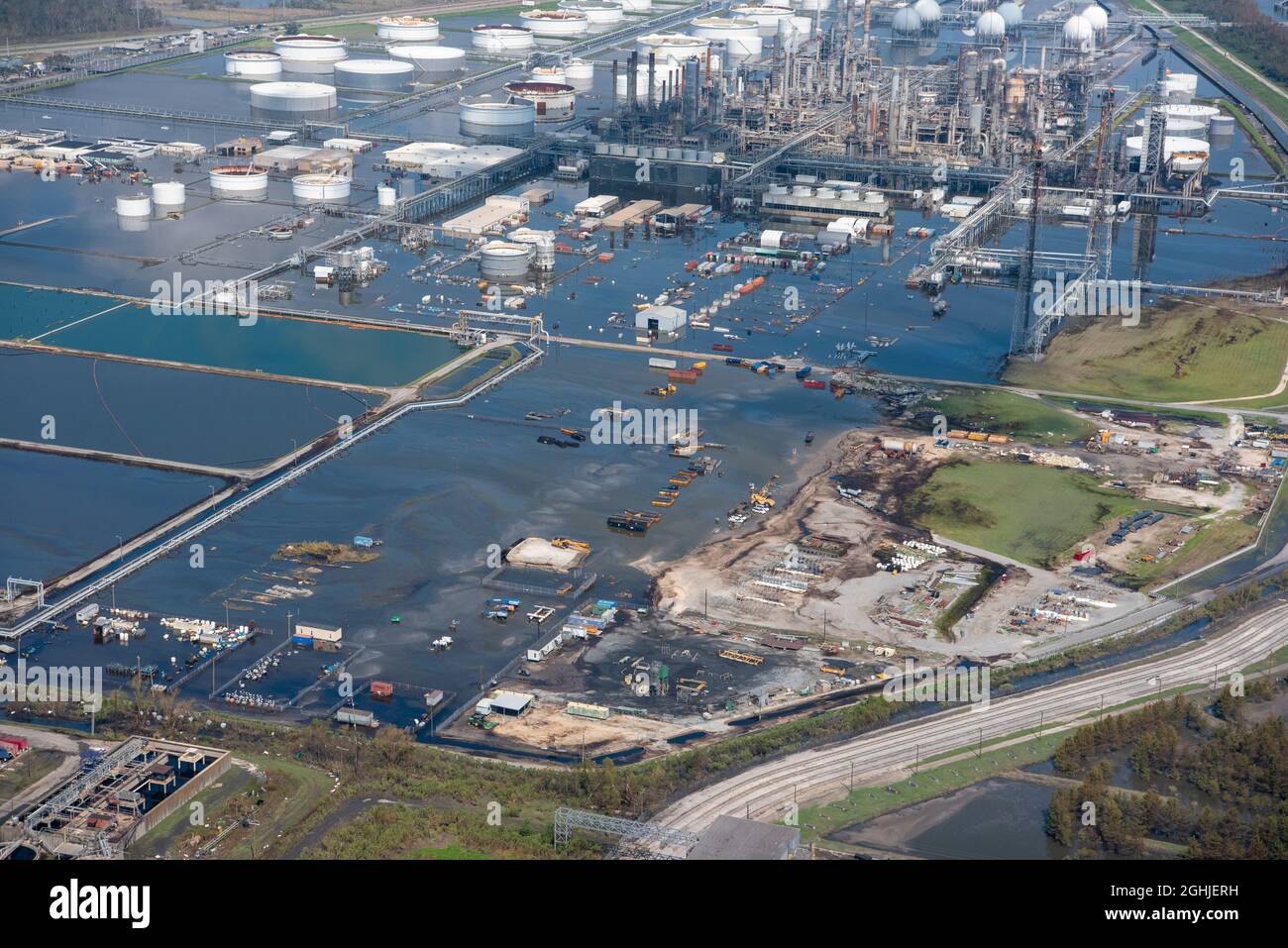 Belle Chasse, United States of America. 03 September, 2021. Aerial view of a flooded oil refinery caused by Category 4 Hurricane Ida along the west bank of the Mississippi River at Plaquemines Parish September 3, 2021 in Belle Chasse, Louisiana. Credit: PO2 Ryan Dickinson/U.S. Coast Guard/Alamy Live News Stock Photo