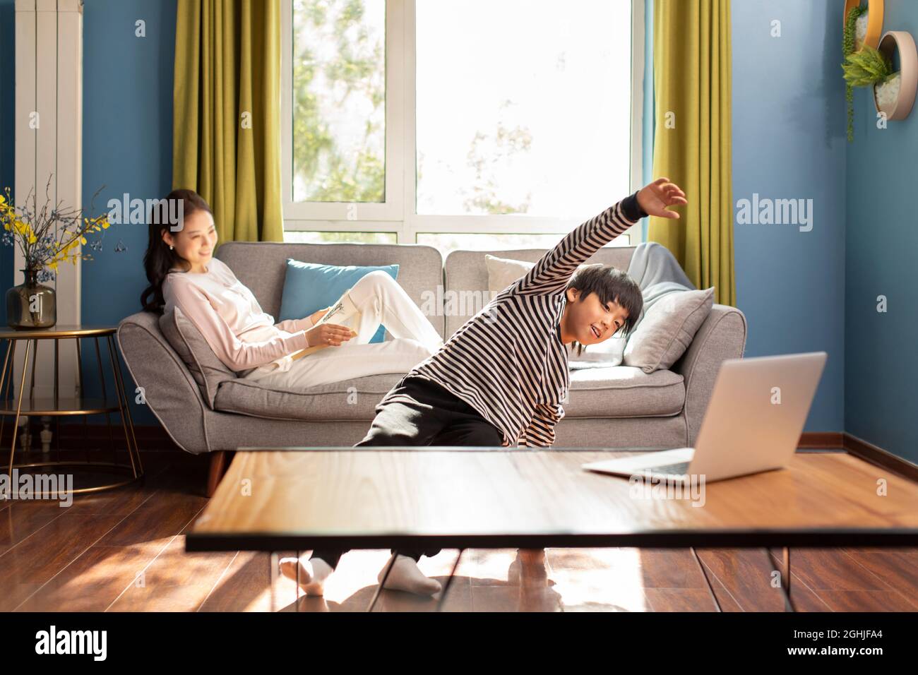 Cute boy dancing at home Stock Photo Alamy