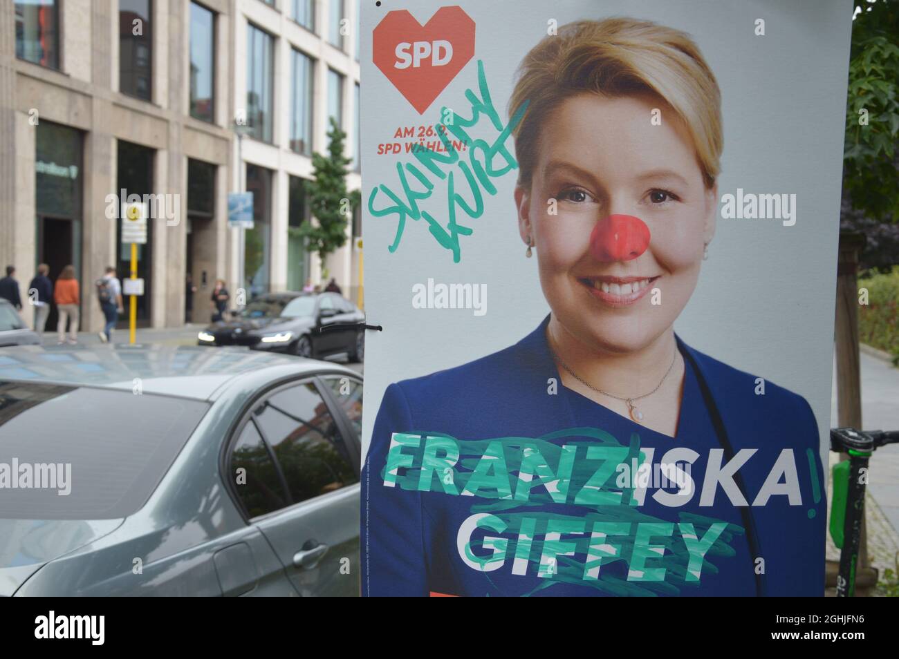 Vandalized election poster of Fraziska Giffey at Vossstrasse in Mitte, Berlin, Germany - September 4, 2021. Stock Photo