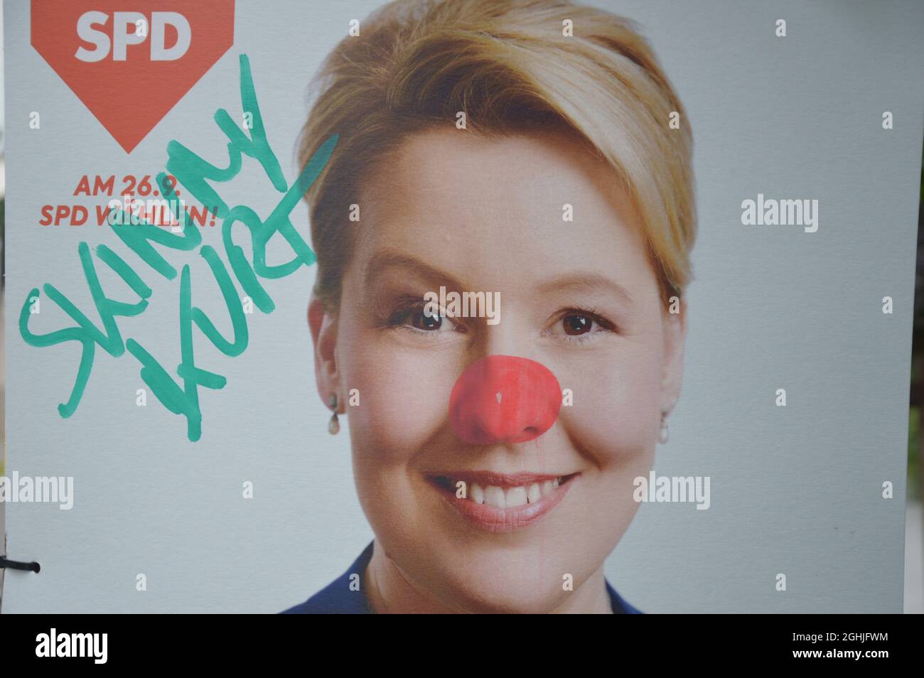 Vandalized election poster of Fraziska Giffey at Vossstrasse in Mitte, Berlin, Germany - September 4, 2021. Stock Photo