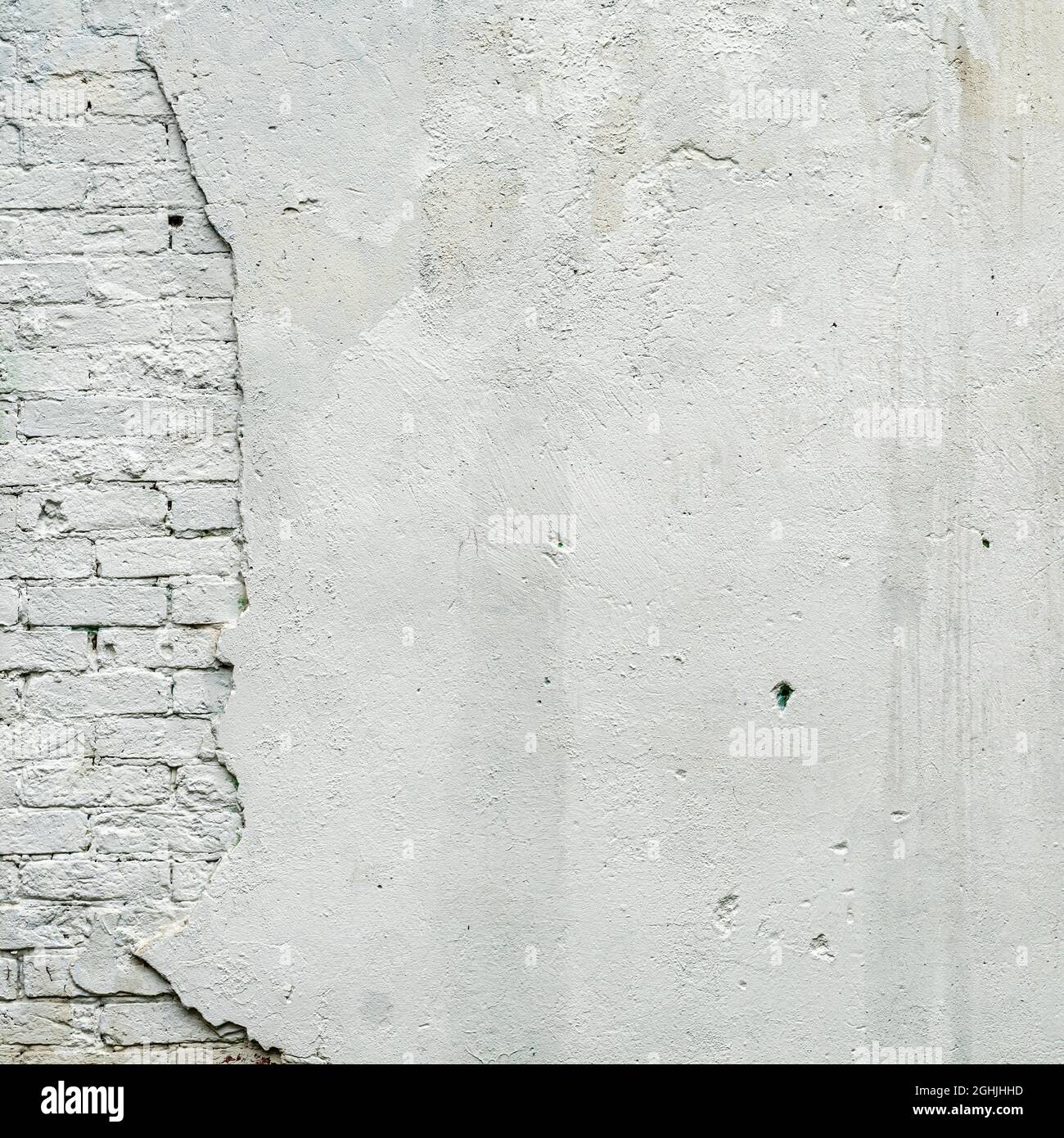 Concrete and white brick wall texture urban background, space for text