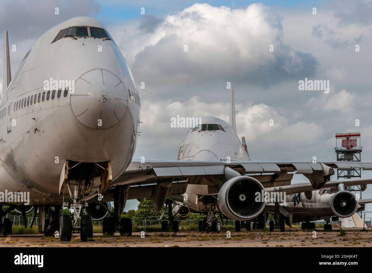 Retired Boeing 747 Jumbo jet airliner planes stored and having had items removed. Manston Airport boneyard, scrapping likely. Surplus airliners Stock Photo