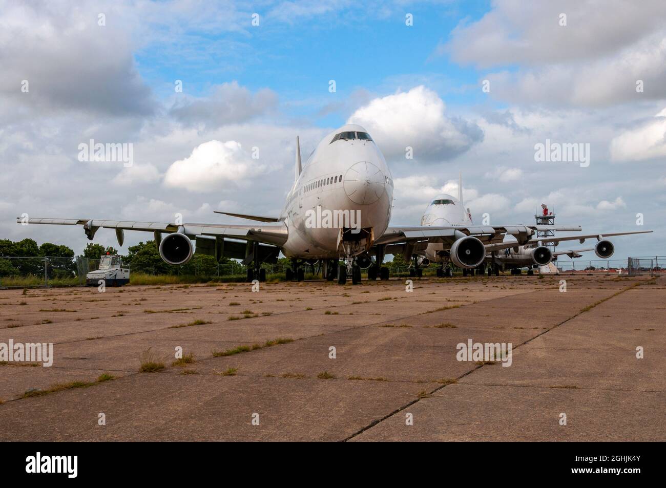 Retired Boeing 747 Jumbo jet airliner planes stored and having had items removed. Manston Airport boneyard, scrapping likely. Surplus airliners Stock Photo