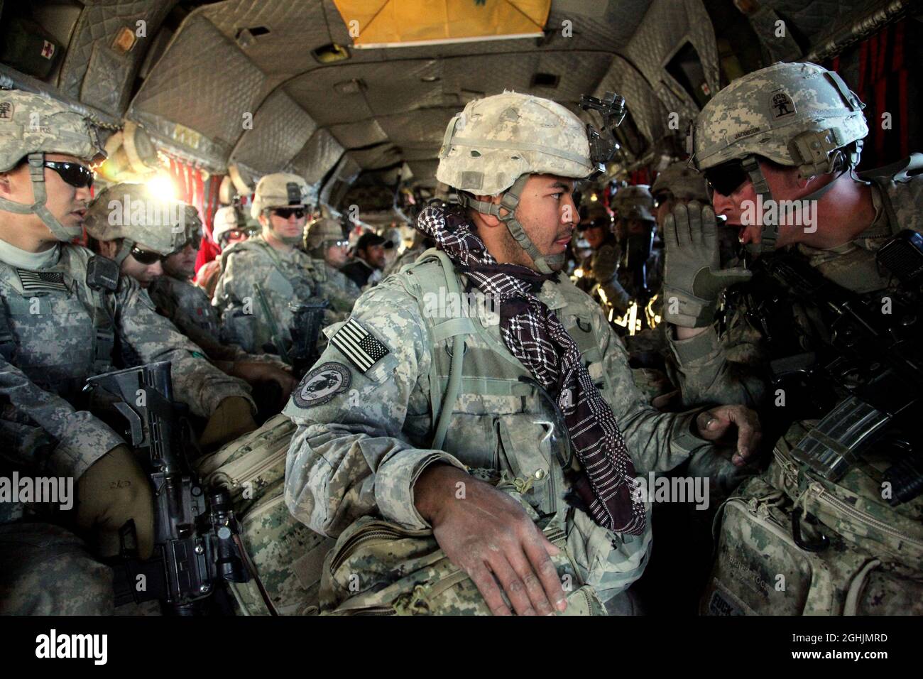 U.S. Army Soldiers prepare to conduct combat operations aboard a CH-47 Chinook helicopter in Paktika province, Afghanistan, Dec. 18. Stock Photo