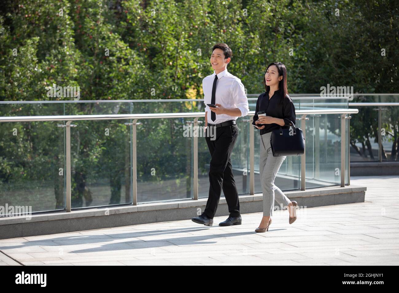 Asian people walking on overpass hi-res stock photography and images ...