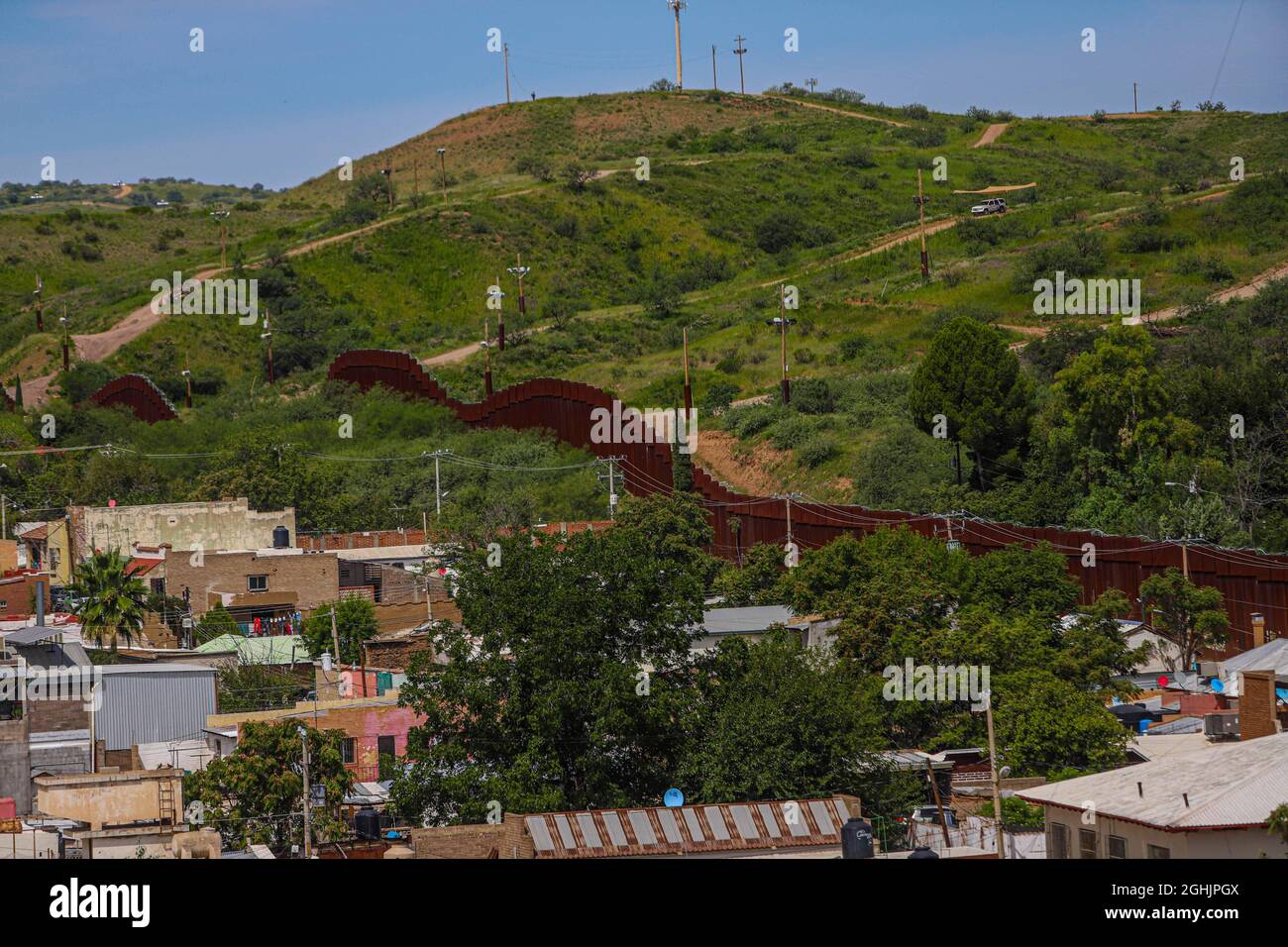 Steel wall on the border of Nogales, Sonora Mexico and to the north the ...