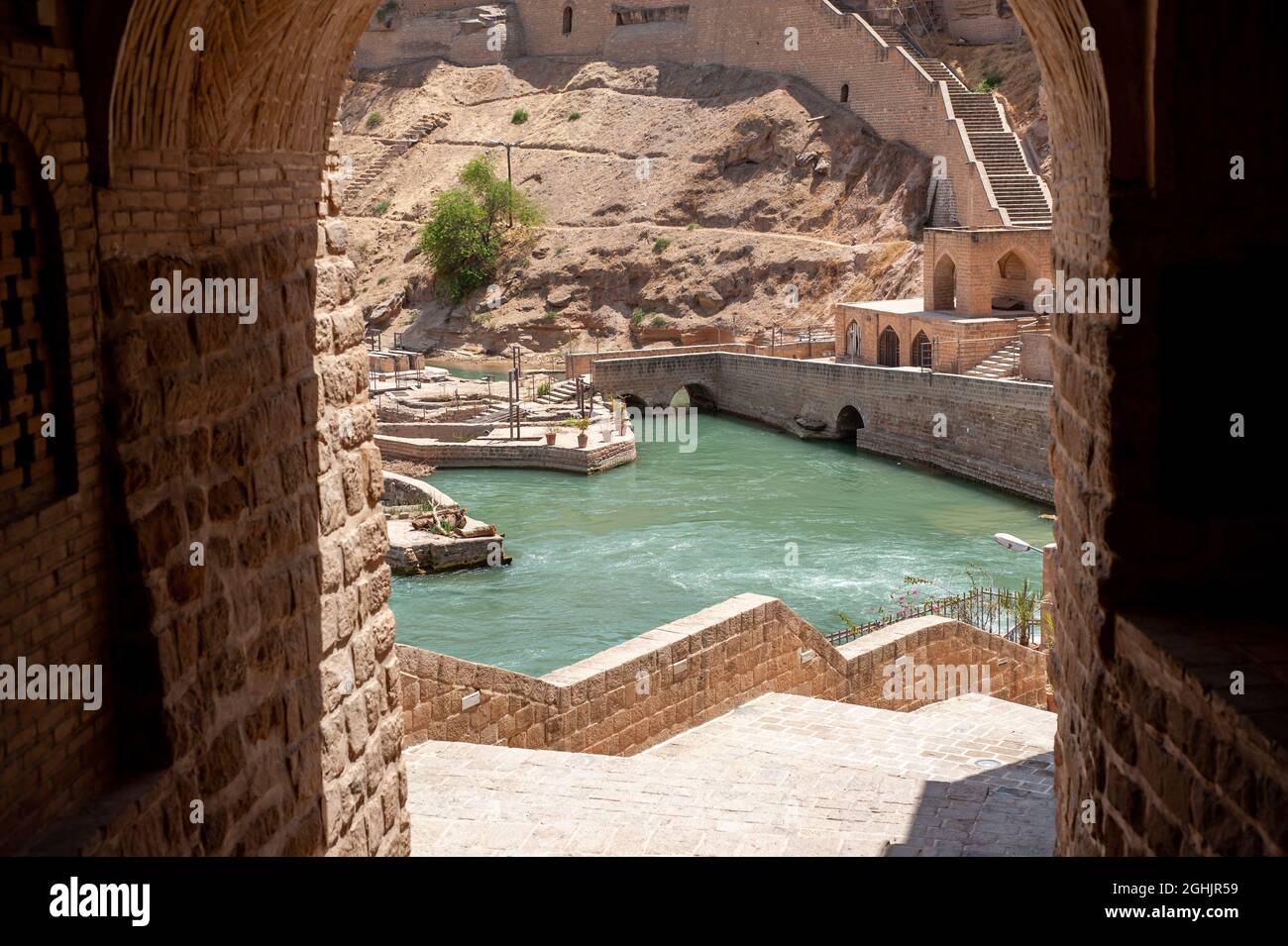 Shushtar Historical Hydraulic System with old houses constructions around, complex irrigation system of the city Shushtar from the Sassanid era. Khuze Stock Photo