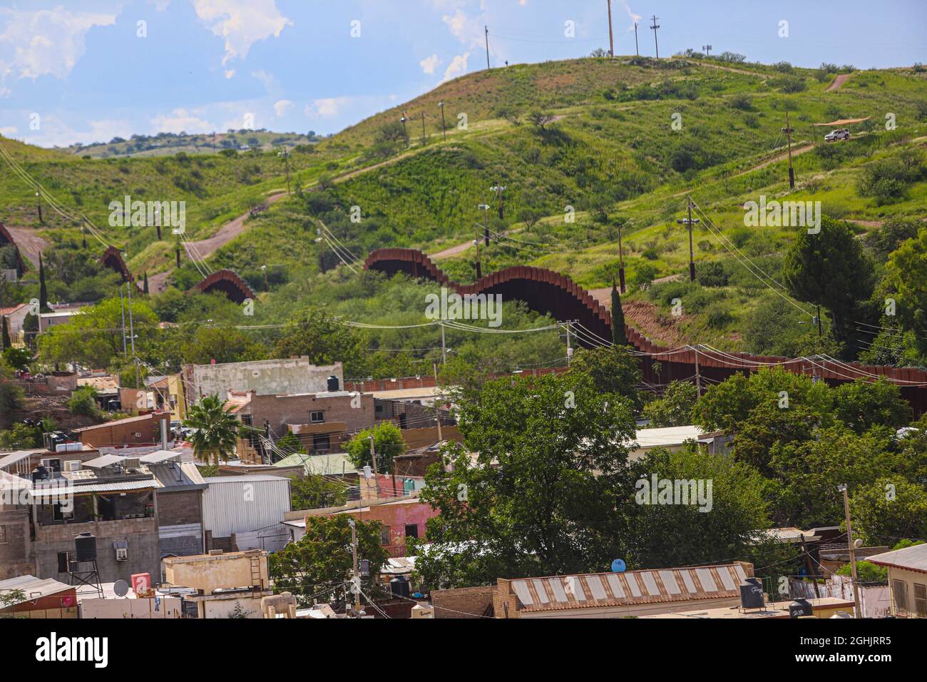 Steel wall on the border of Nogales, Sonora Mexico and to the north the ...