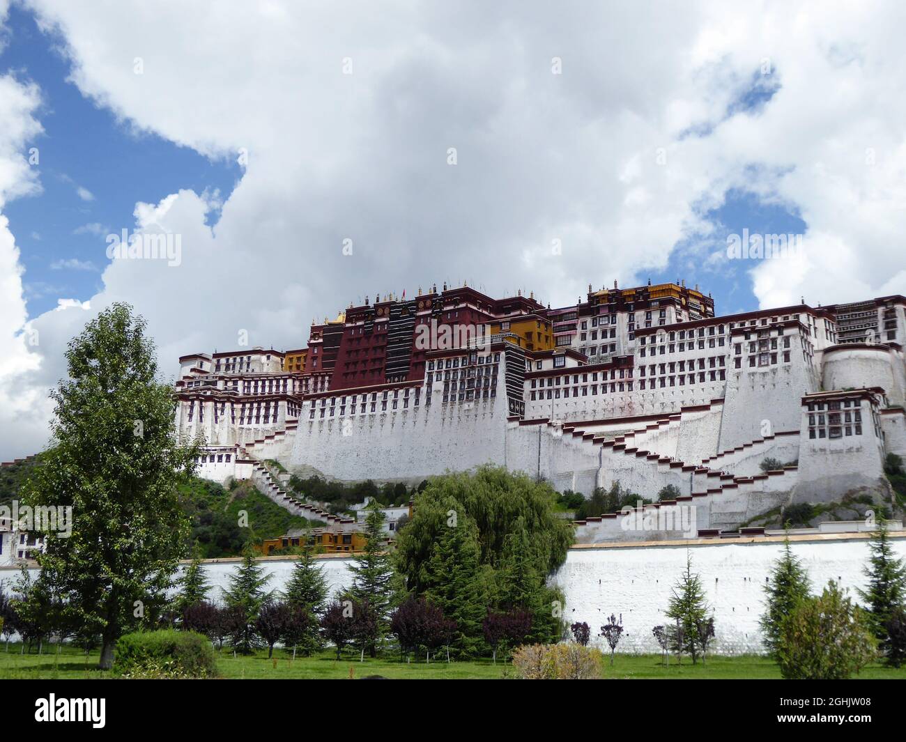View of Potala Palace taken from Central Beijing Road, Lhasa, Tibet Autonomous Region - Aug 2014 Stock Photo