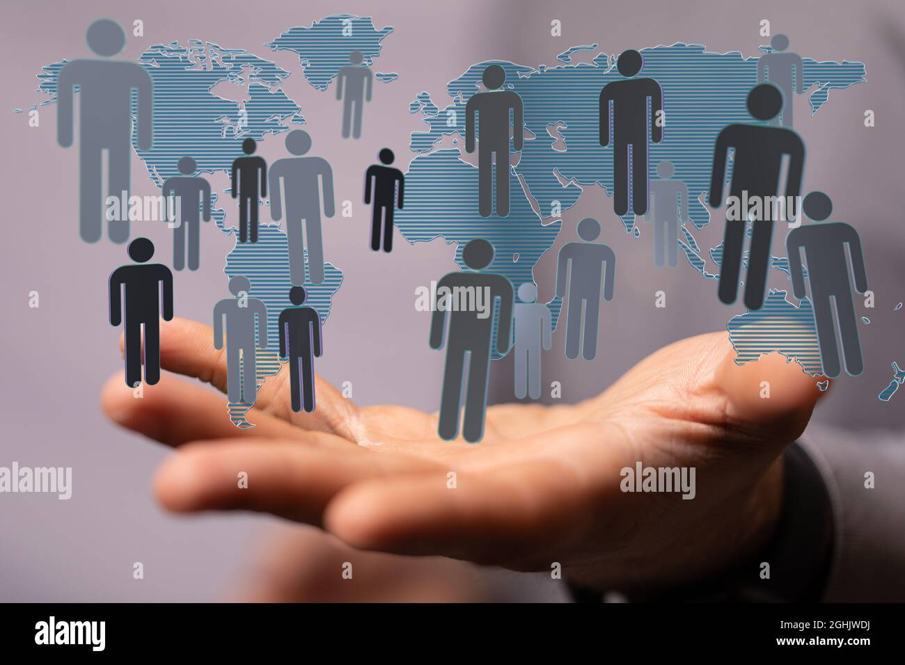 3D rendering of people silhouettes and a world map hovering over a man ...