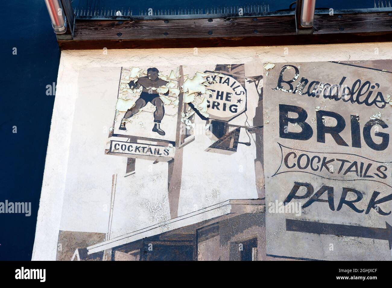 Detail showing Sun damage to mural  at Brandell'is Brig on Abbot Kinney in Venice, CA Stock Photo