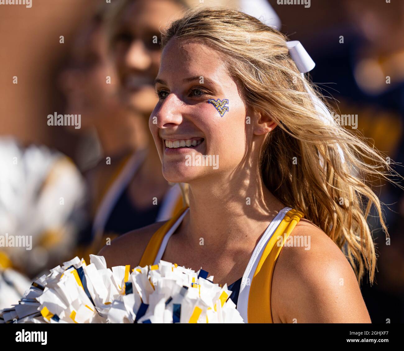 A West Virginia Mountaineers cheerleader looks on during the NCAA college football game between West Virginia and Maryland on Saturday September 4, 2021 at Capital One Field at Maryland Stadium in College Park, MD. Jacob Kupferman/CSM Stock Photo