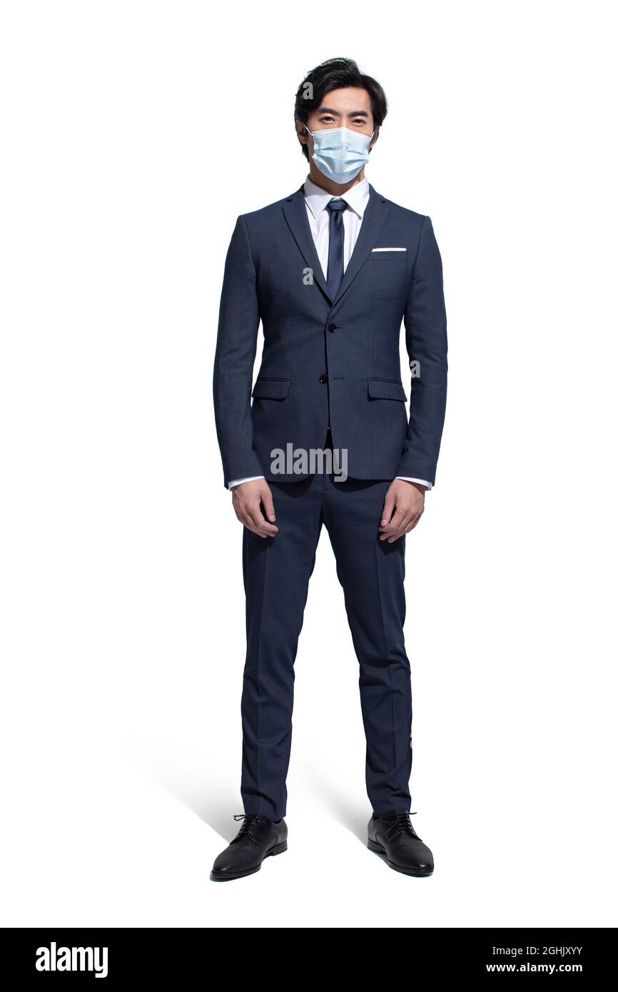 Wearing surgical mask suit hi-res stock photography and images - Alamy