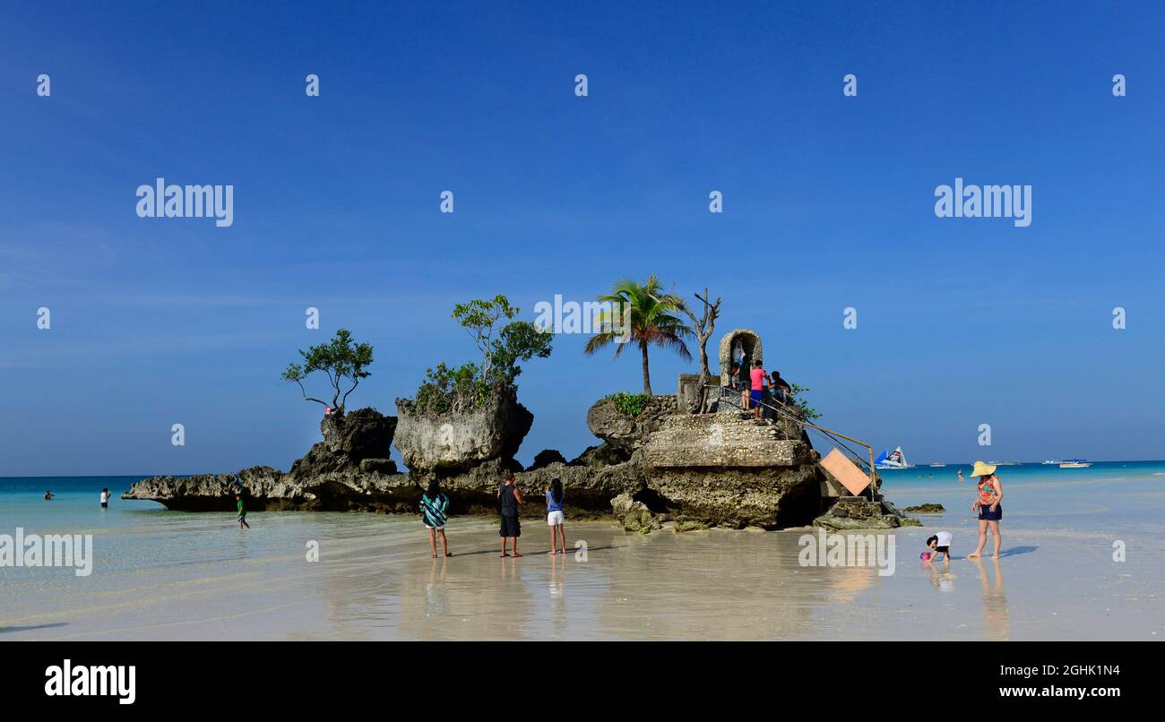 Willy's Rock by the white sand beach in Boracay, The Philippines. Stock Photo