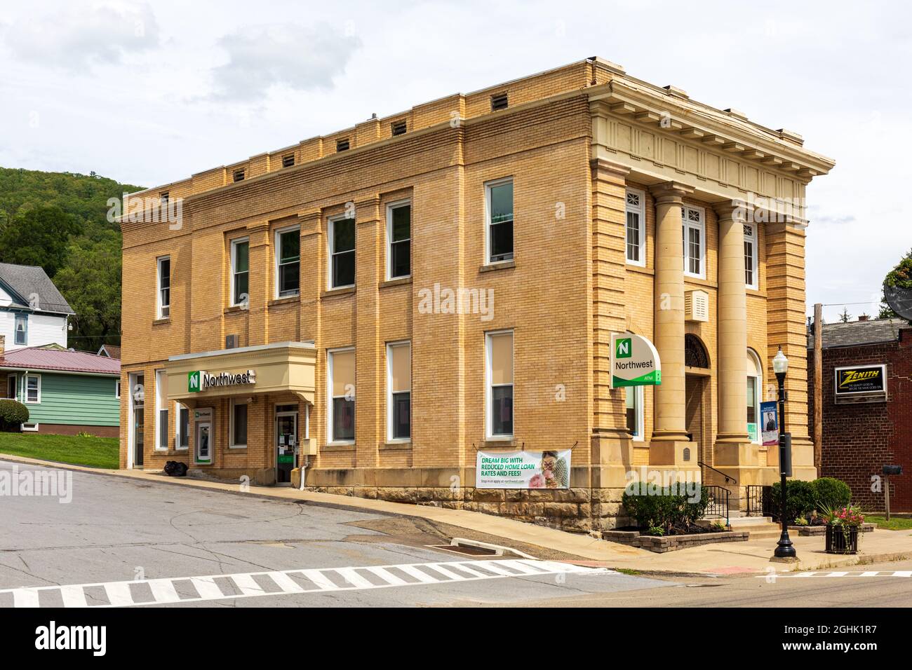 SMETHPORT, PA, USA-15 AUGUST 2021: Yellow brick Federal style building  housing the Northwest Bank on Main Street Stock Photo - Alamy