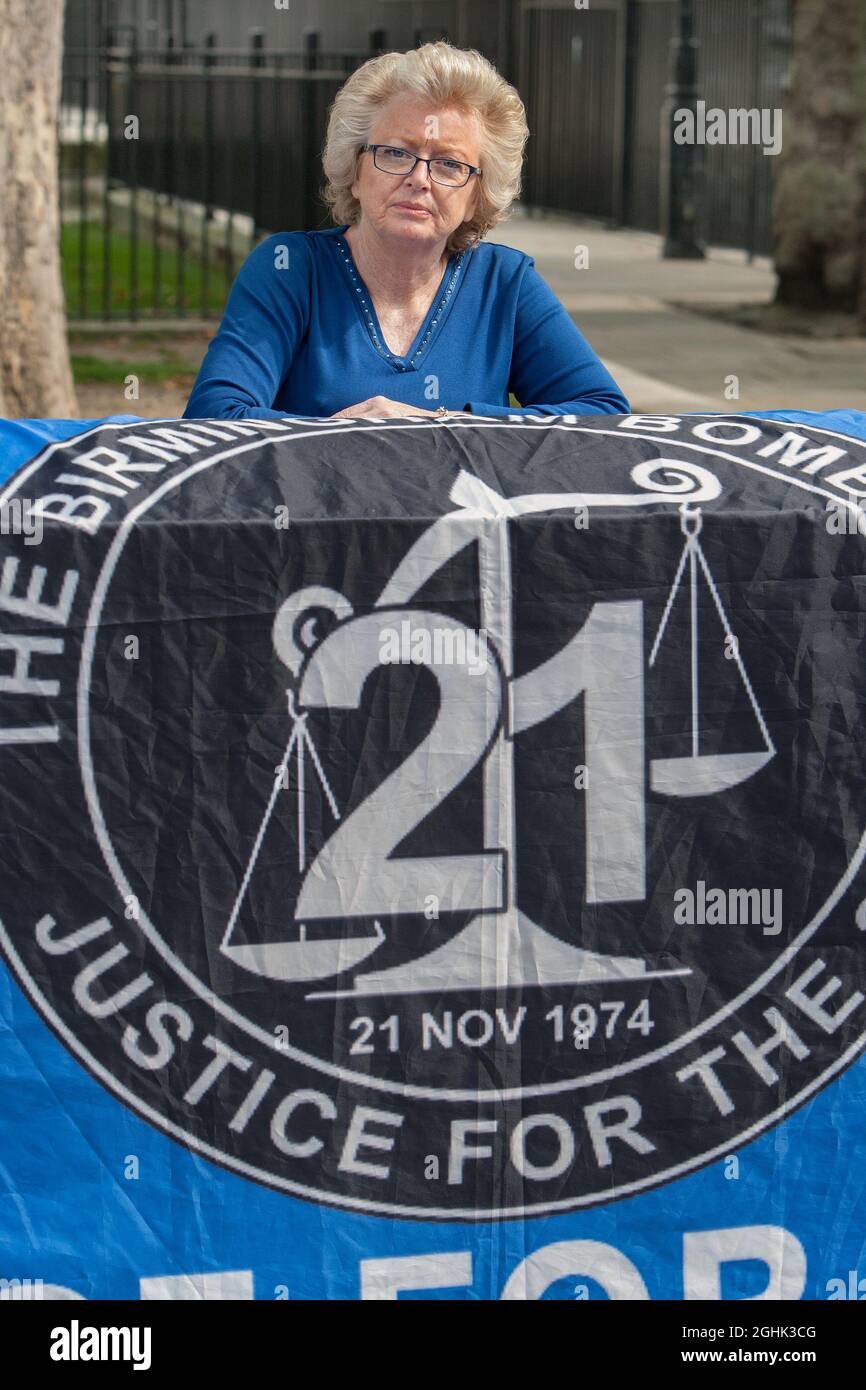 London, UK. 06th Sep, 2021. Julie Hambleton protests opposite the gates to Downing Street. Her organisation Justice for the 21 seek truth, justice and accountability on behalf of those killed in the Birmingham pub bombings in 1974. Mrs Hambleton lost her sister in the bombings. As MP's return to Parliament numerous small protest groups remind the politicians that large range of people are unhappy and there are many pressing issues to deal with this term. Credit: SOPA Images Limited/Alamy Live News Stock Photo